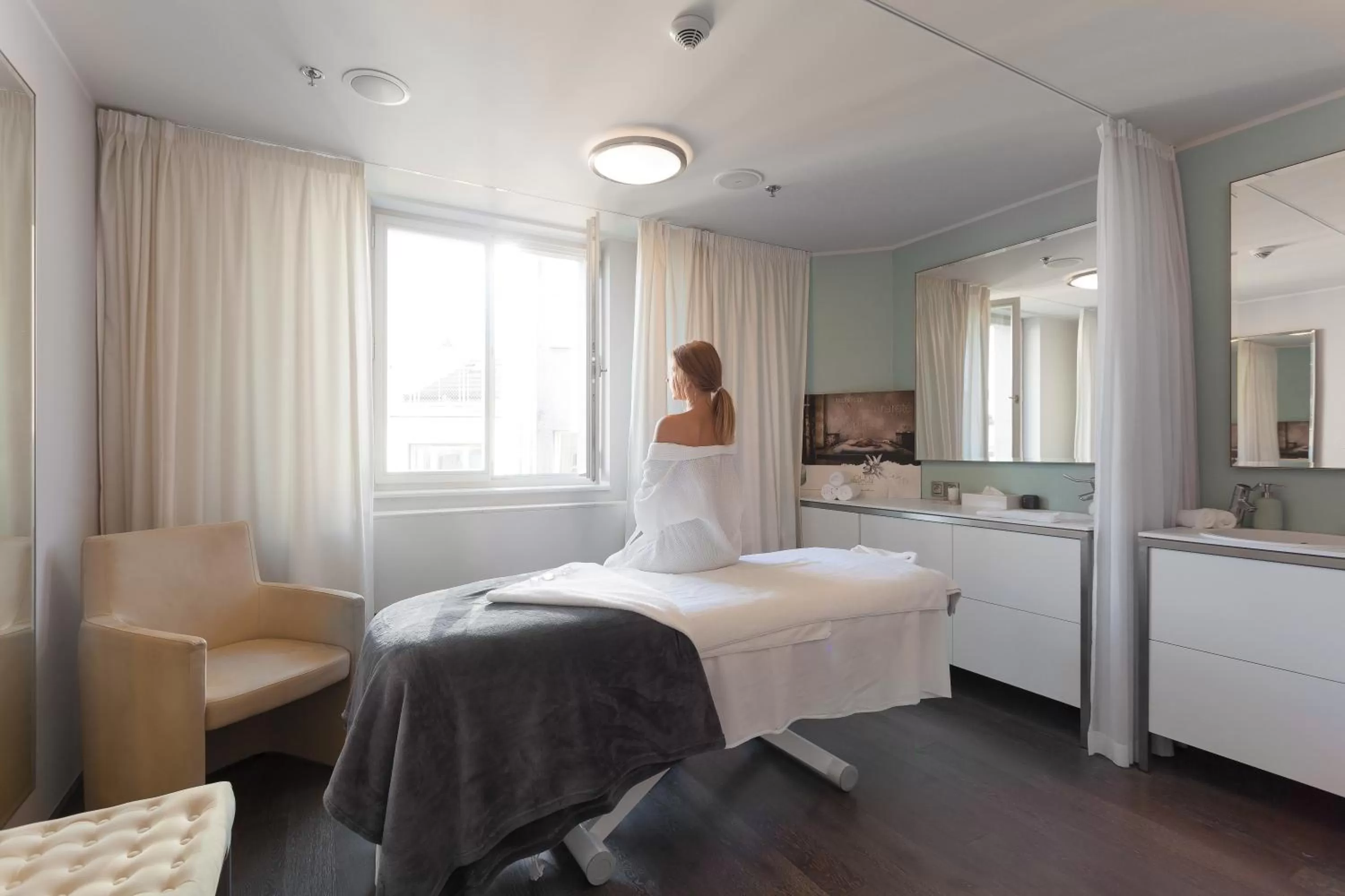 Massage, Bed in Old Town Square Residence by Emblem