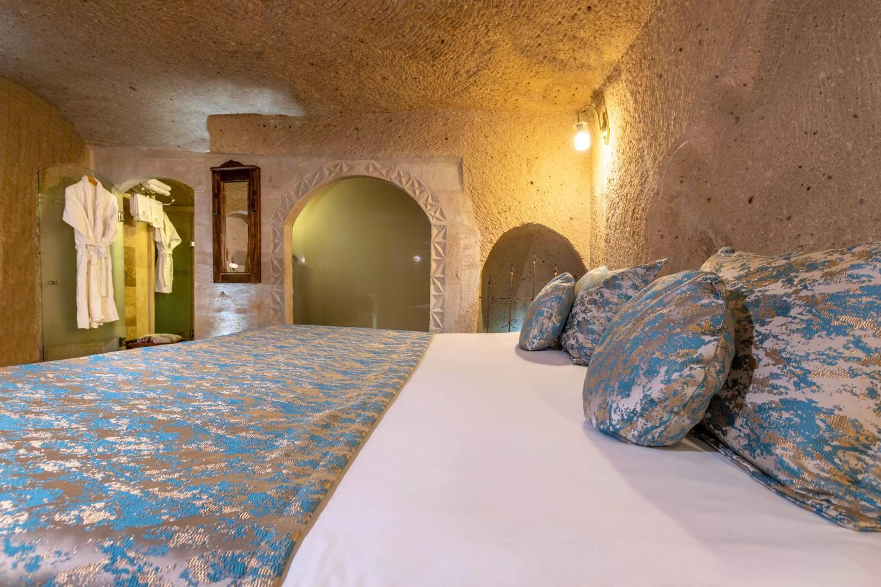 Bed in Adora Cave Suites -