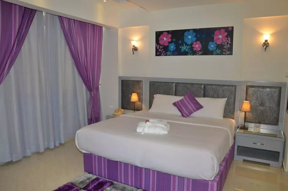 Bed in Kuwait Continental Hotel