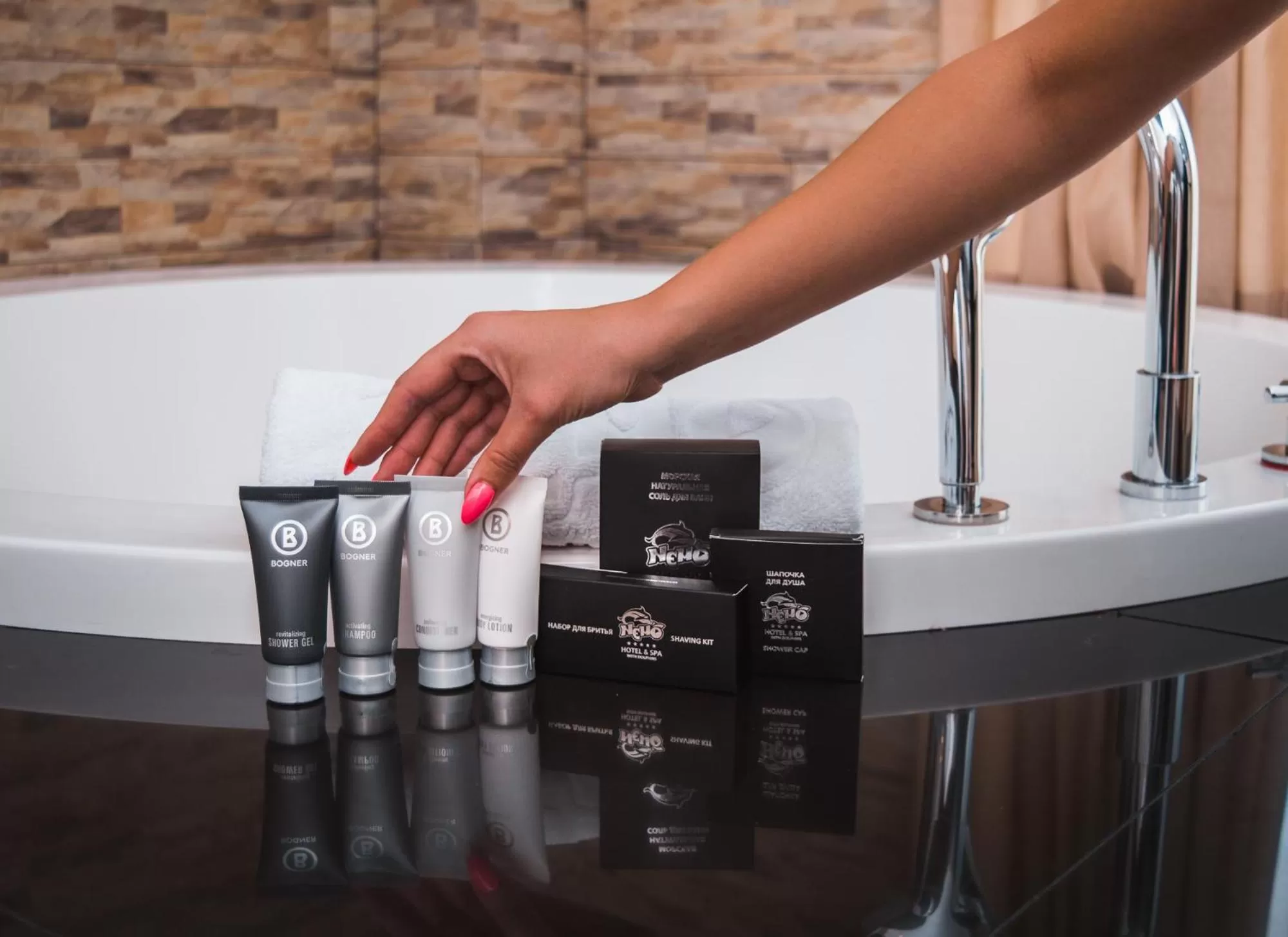 Property logo or sign in Hotel & Spa NEMO with dolphins