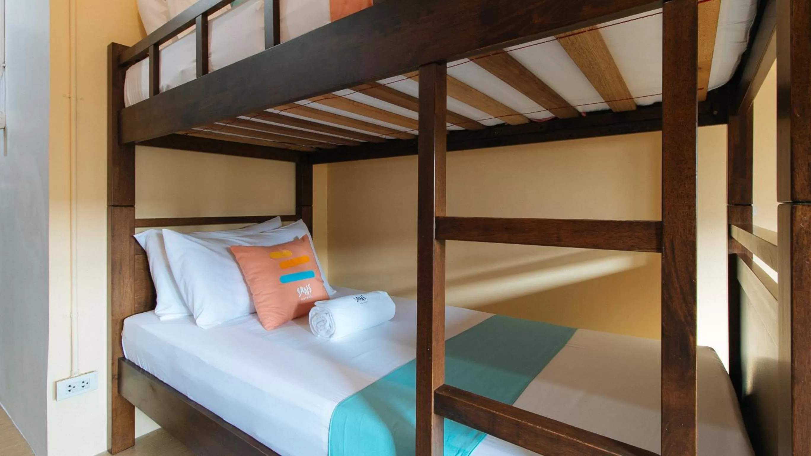 Bed in Sans Hotel Laperal Manila