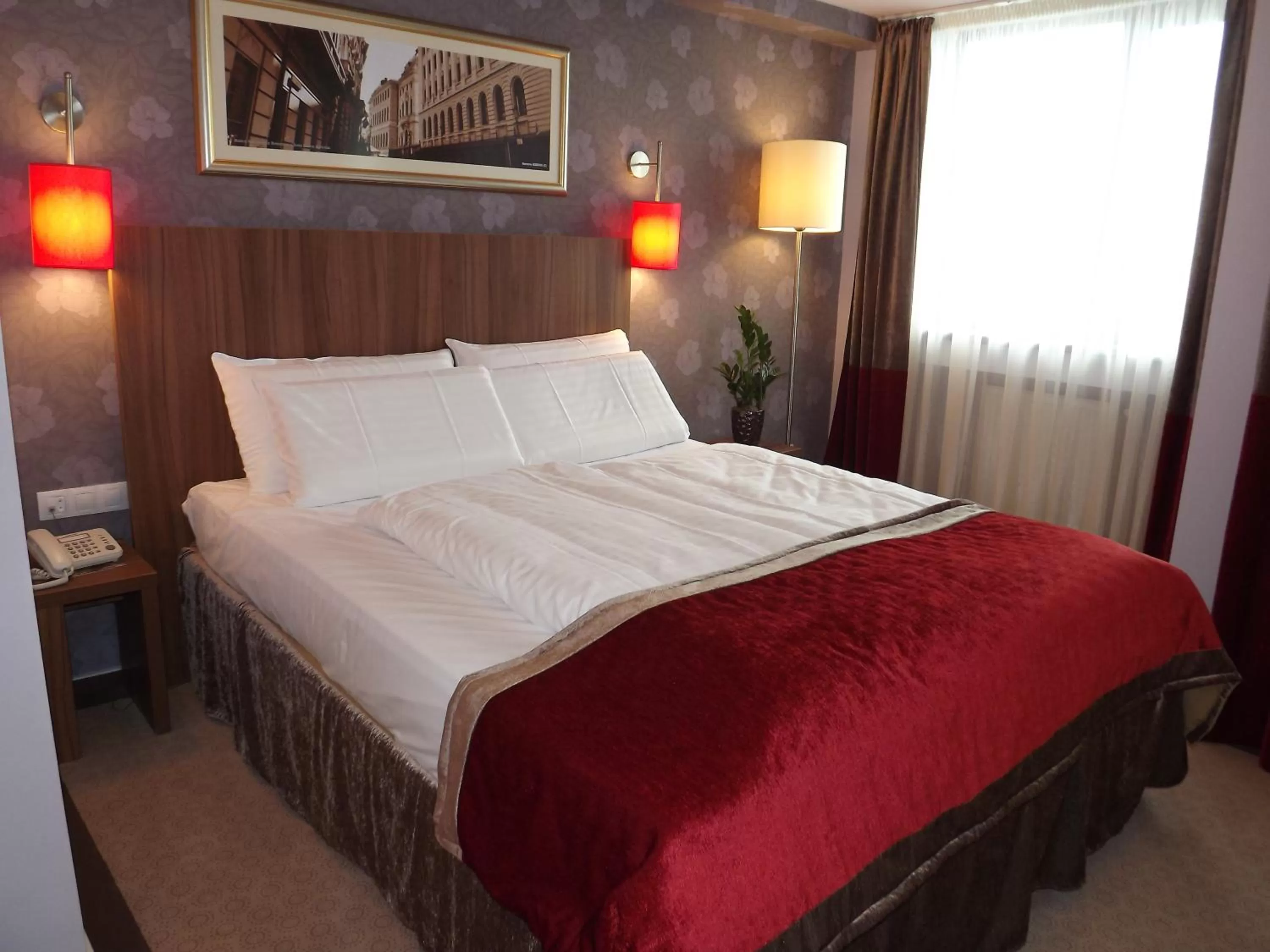 Bed in Hotel Ambasador