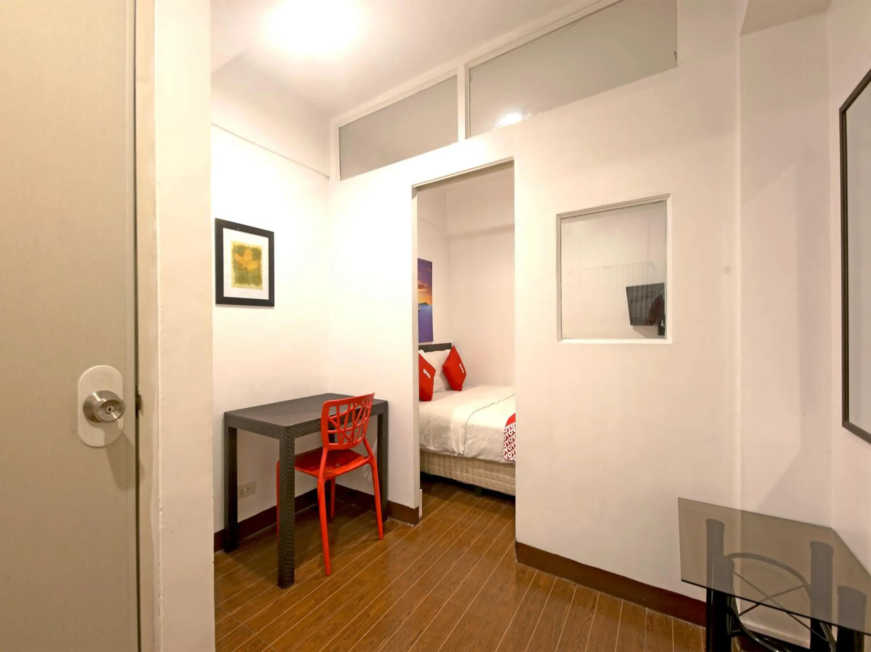 Seating area, Bed in OYO 858 City Stay Inns Bgc Nuevo