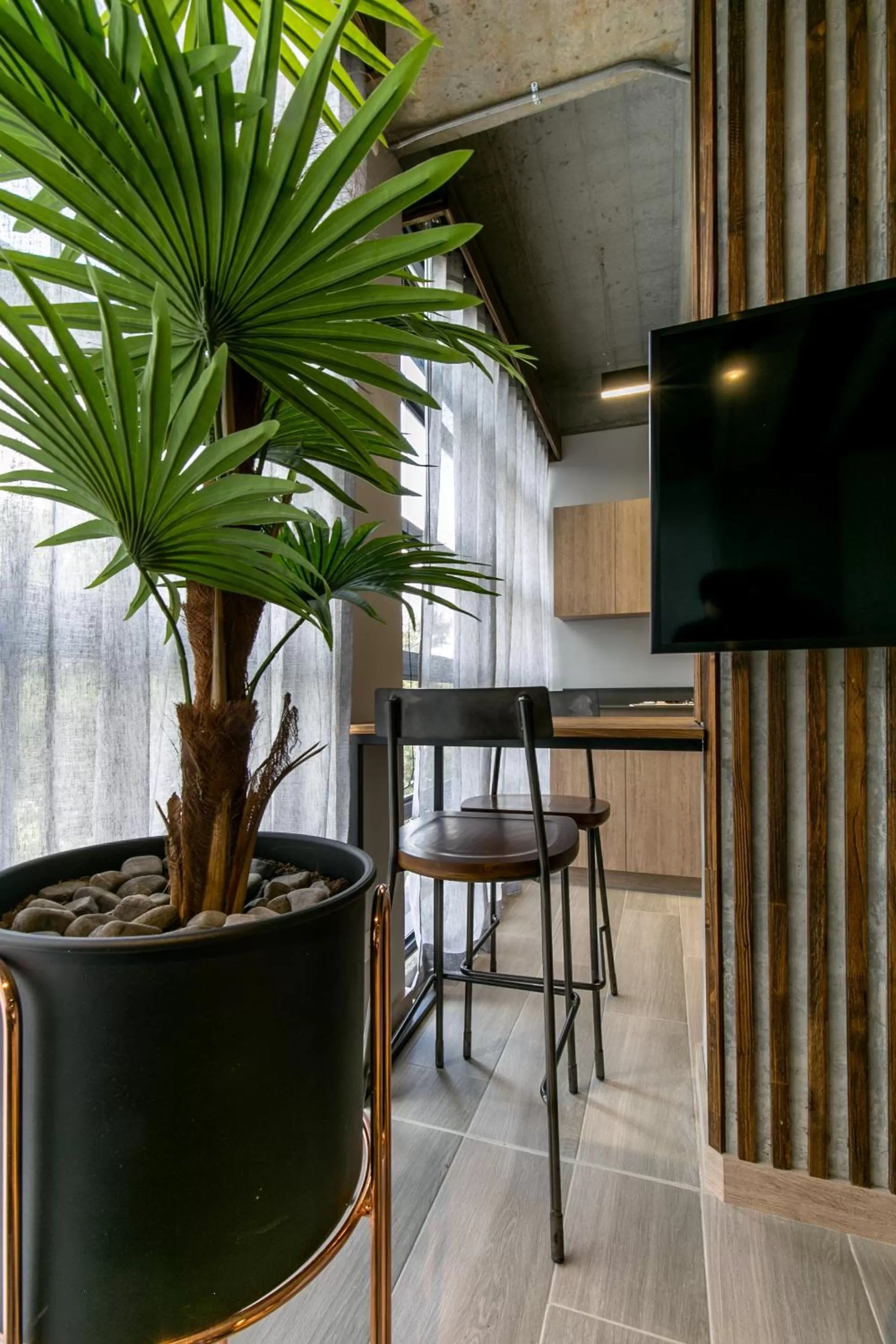 Communal lounge/ TV room in Factory Lofts Hotel