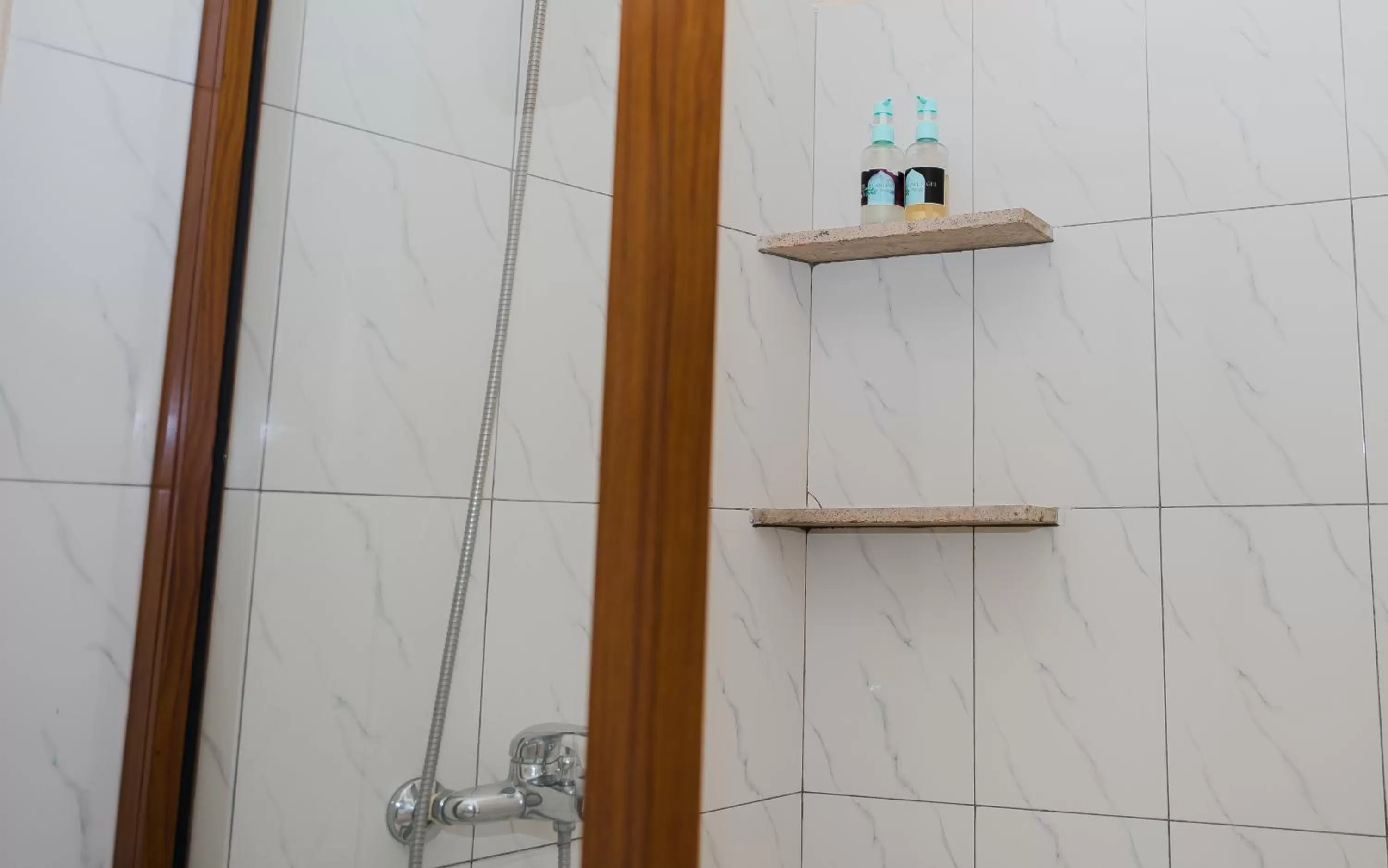 Bathroom in Emerald Palm Boutique Hotel