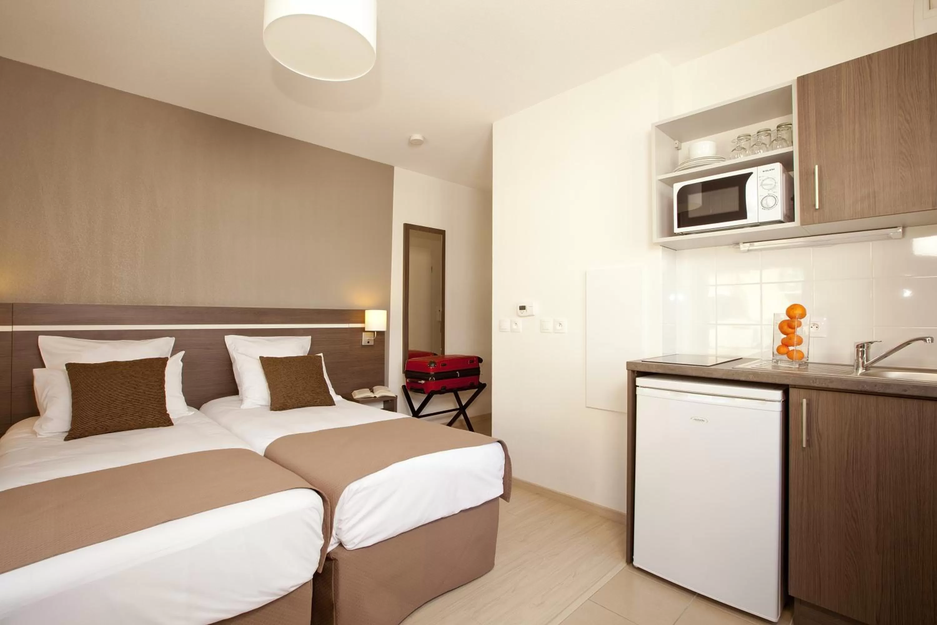 Decorative detail, Bed in Séjours & Affaires Massy Atlantis