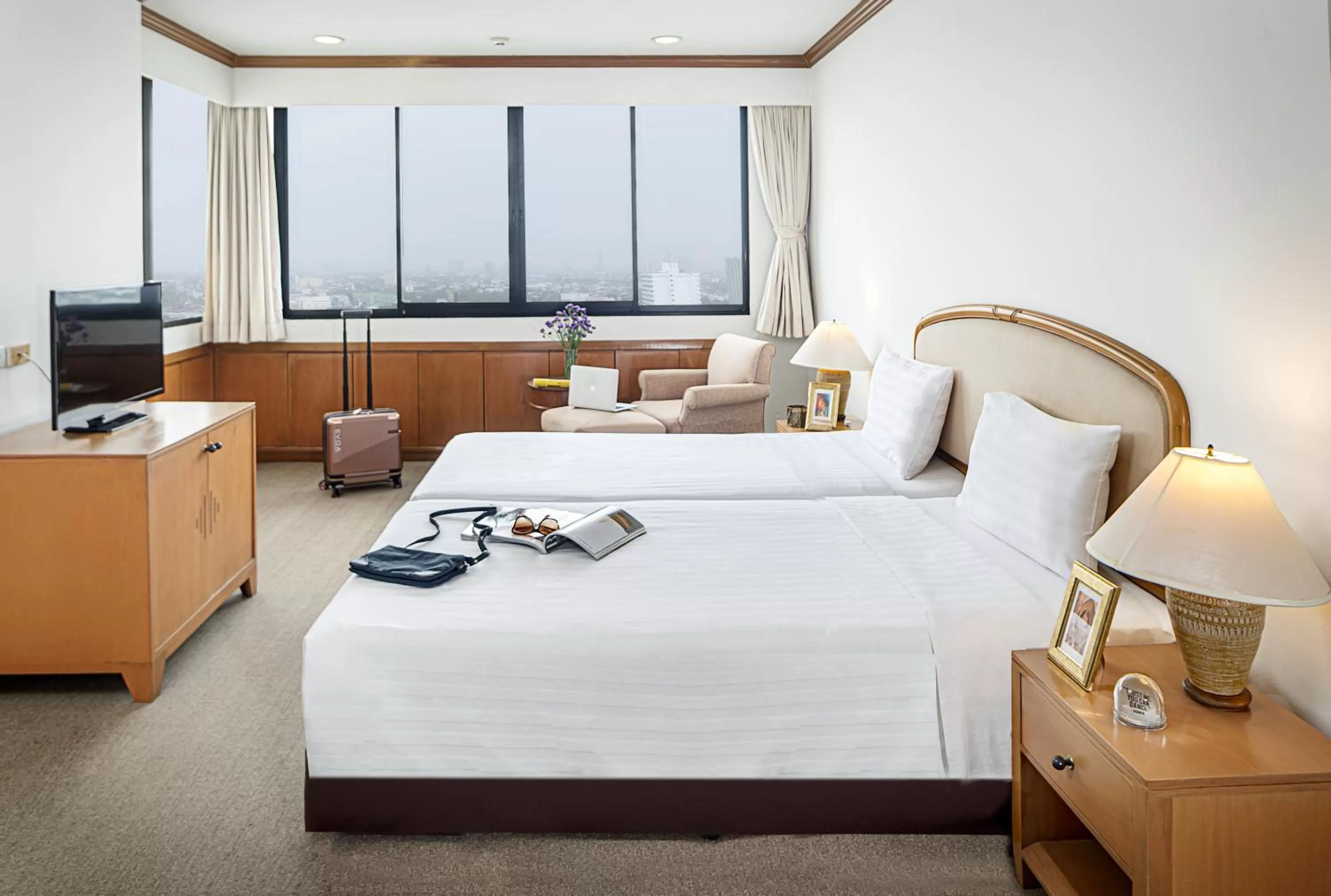 Bed in Riverine Place Hotel and Residence