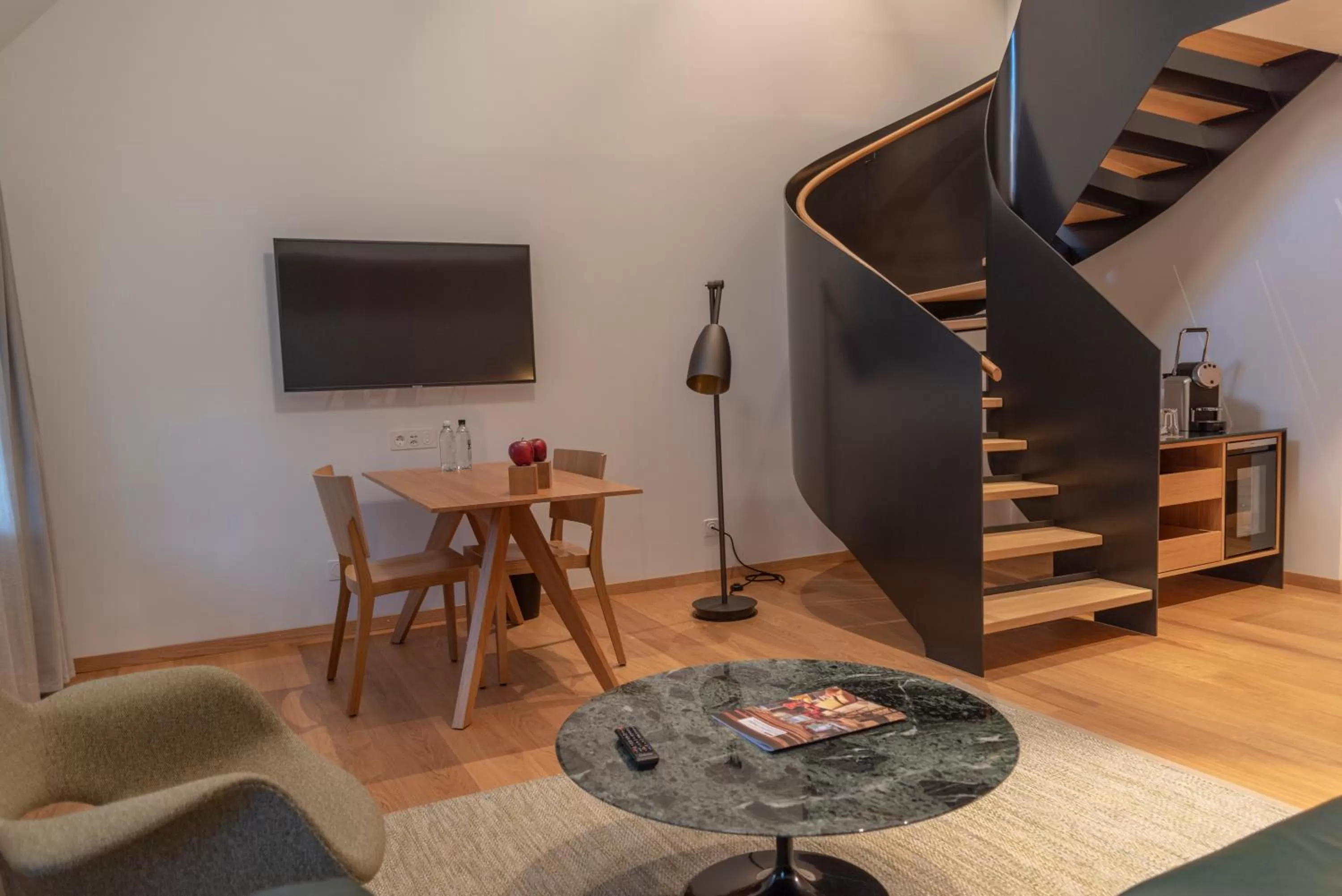 Living room in CASPAR Swiss Quality Hotel