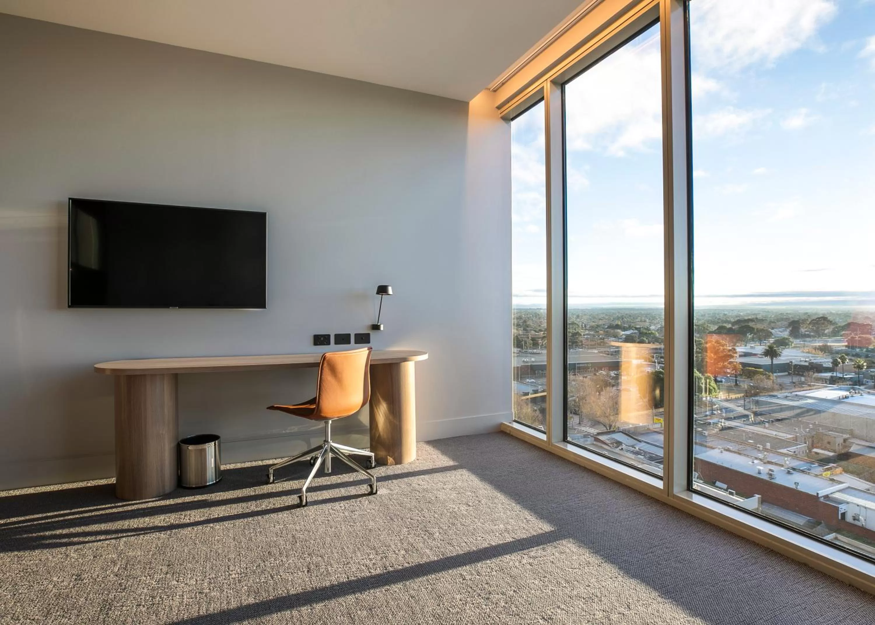 Communal lounge/ TV room in Holiday Inn Werribee by IHG