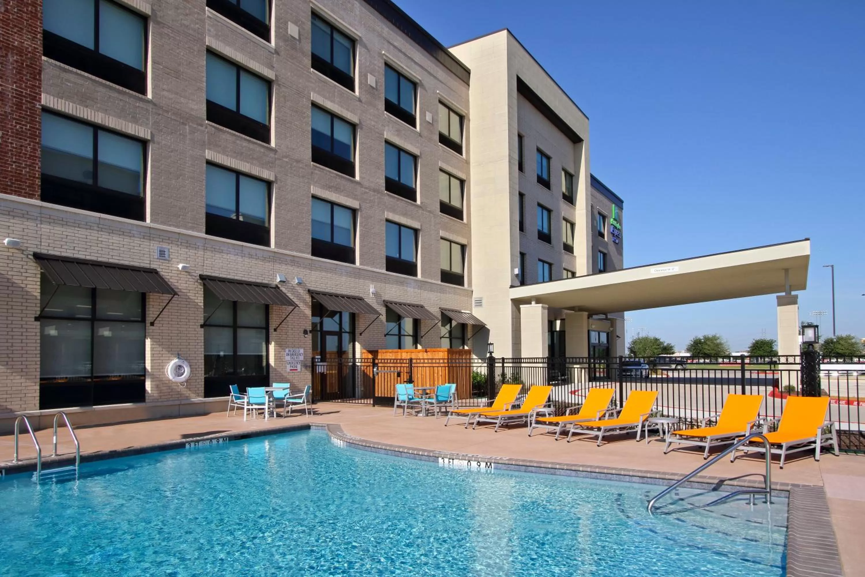Swimming pool in Holiday Inn Express & Suites Dallas Frisco NW Toyota Stdm by IHG