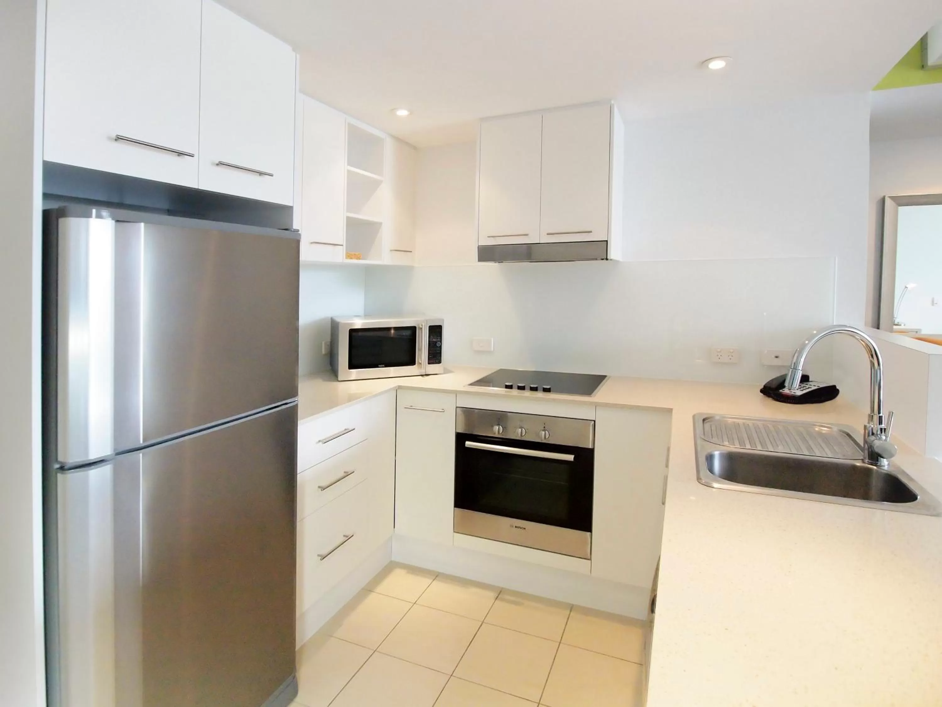 Kitchen or kitchenette in Oaks Townsville Gateway Suites