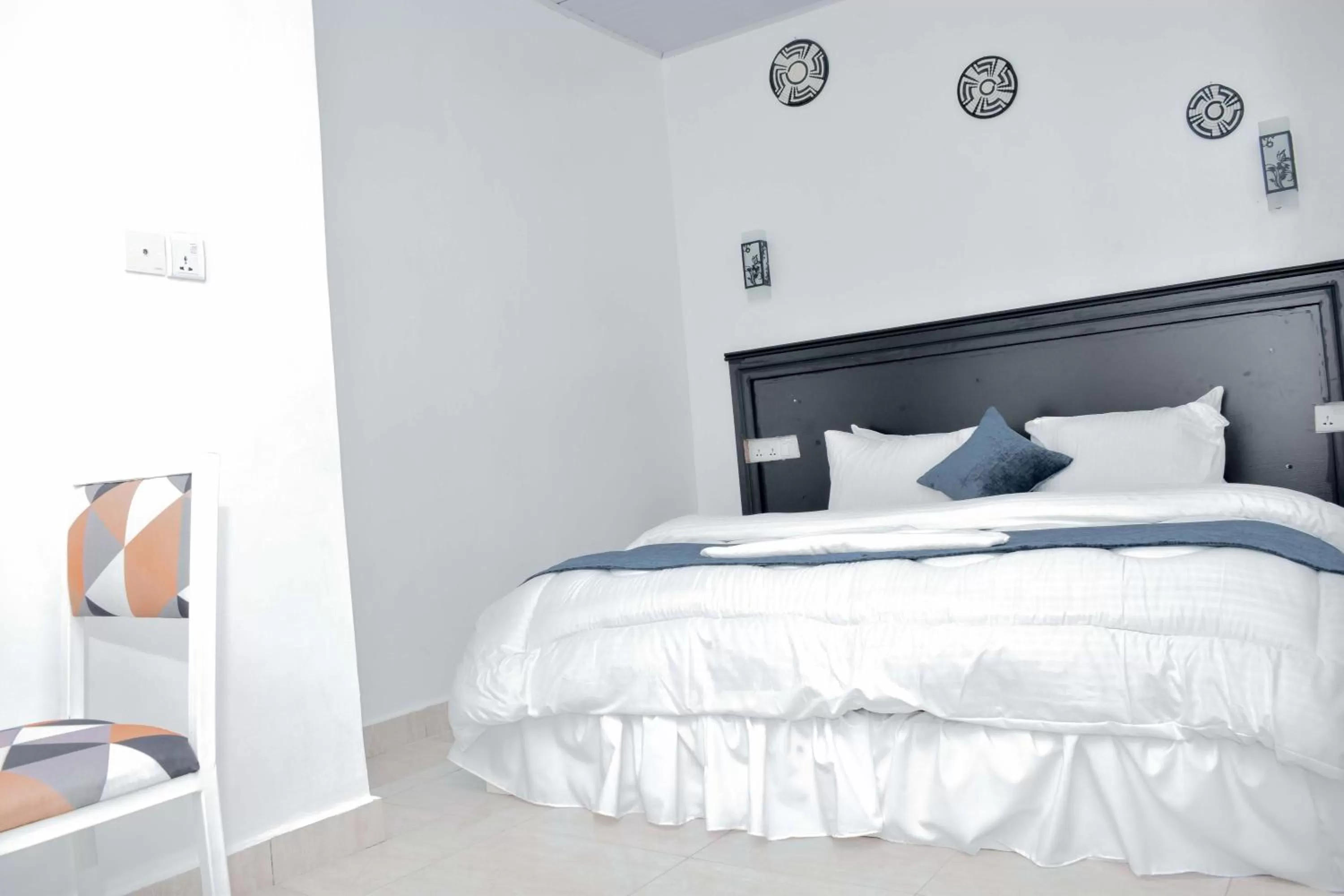 Bed in INZOZI AFRICA HOUSE B&B-Gishushu