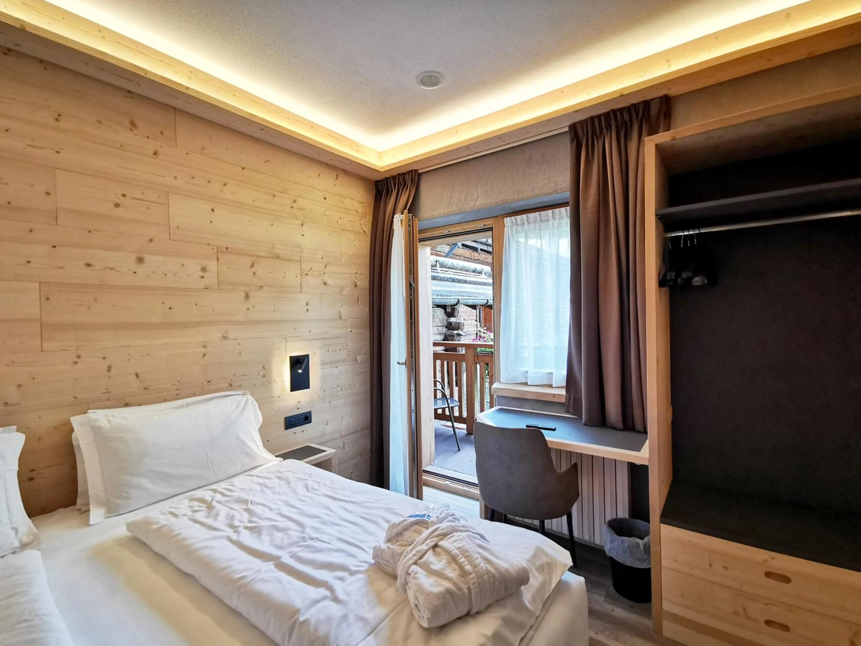 Bed in Francesin Active Hotel