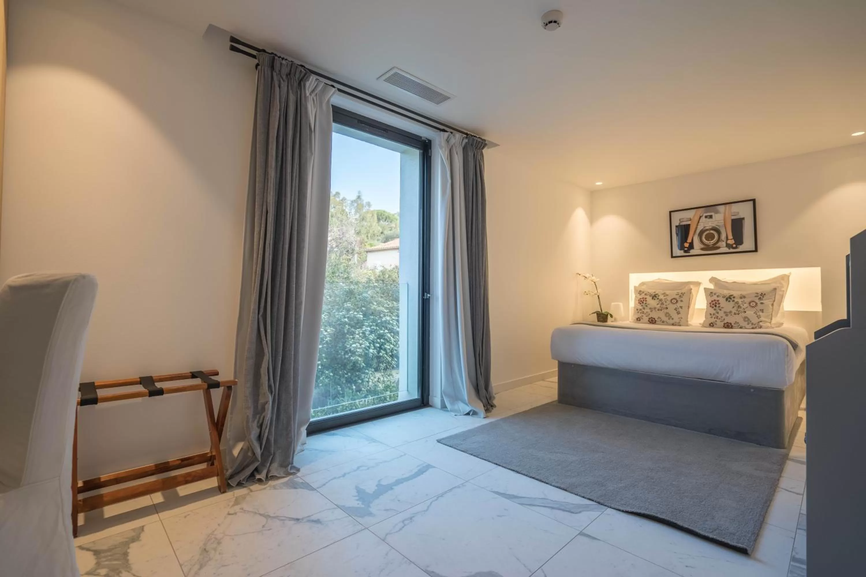 Bed in Hotel le Mandala