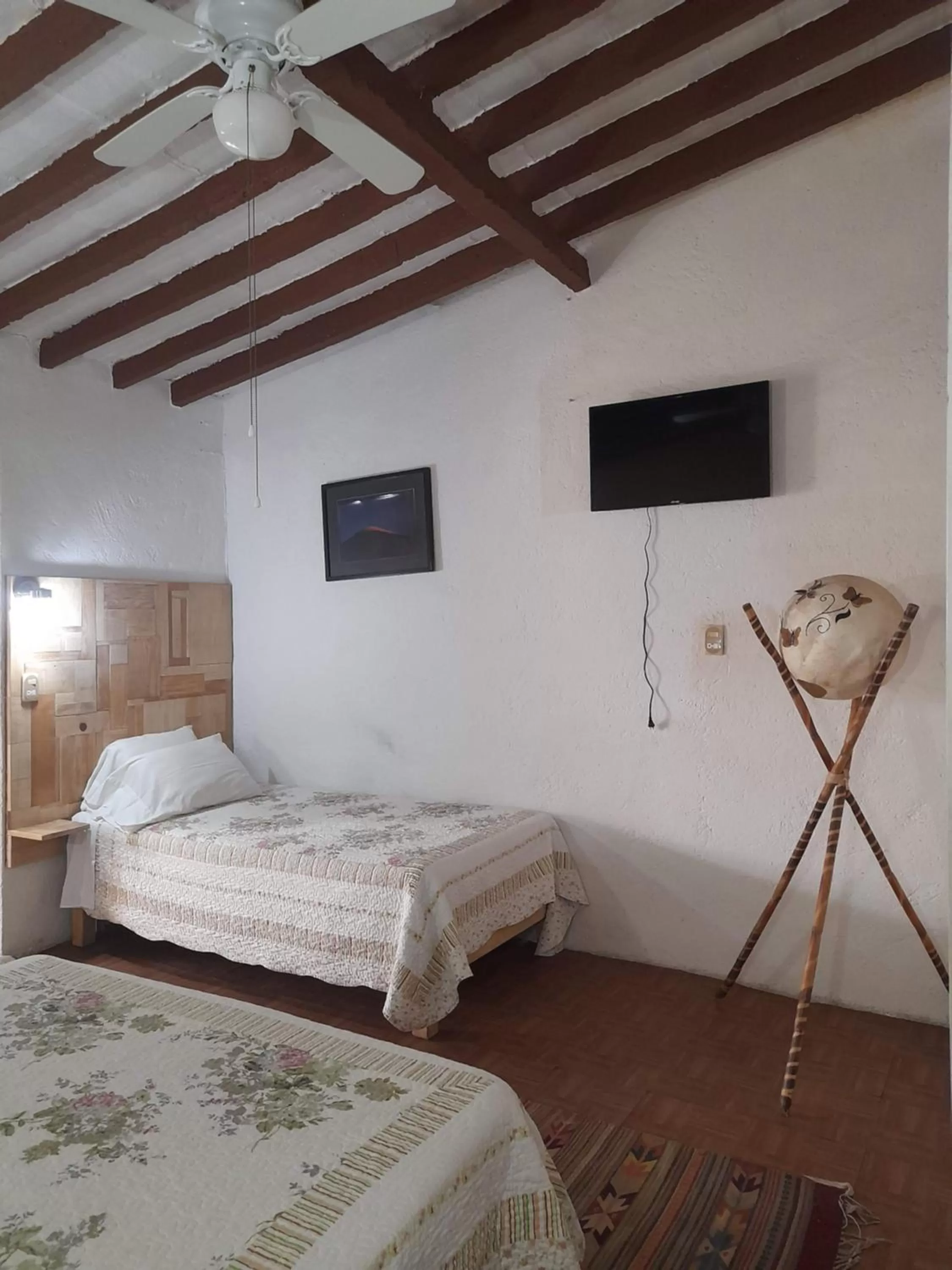 Bed in Posada Casa Topiltzin