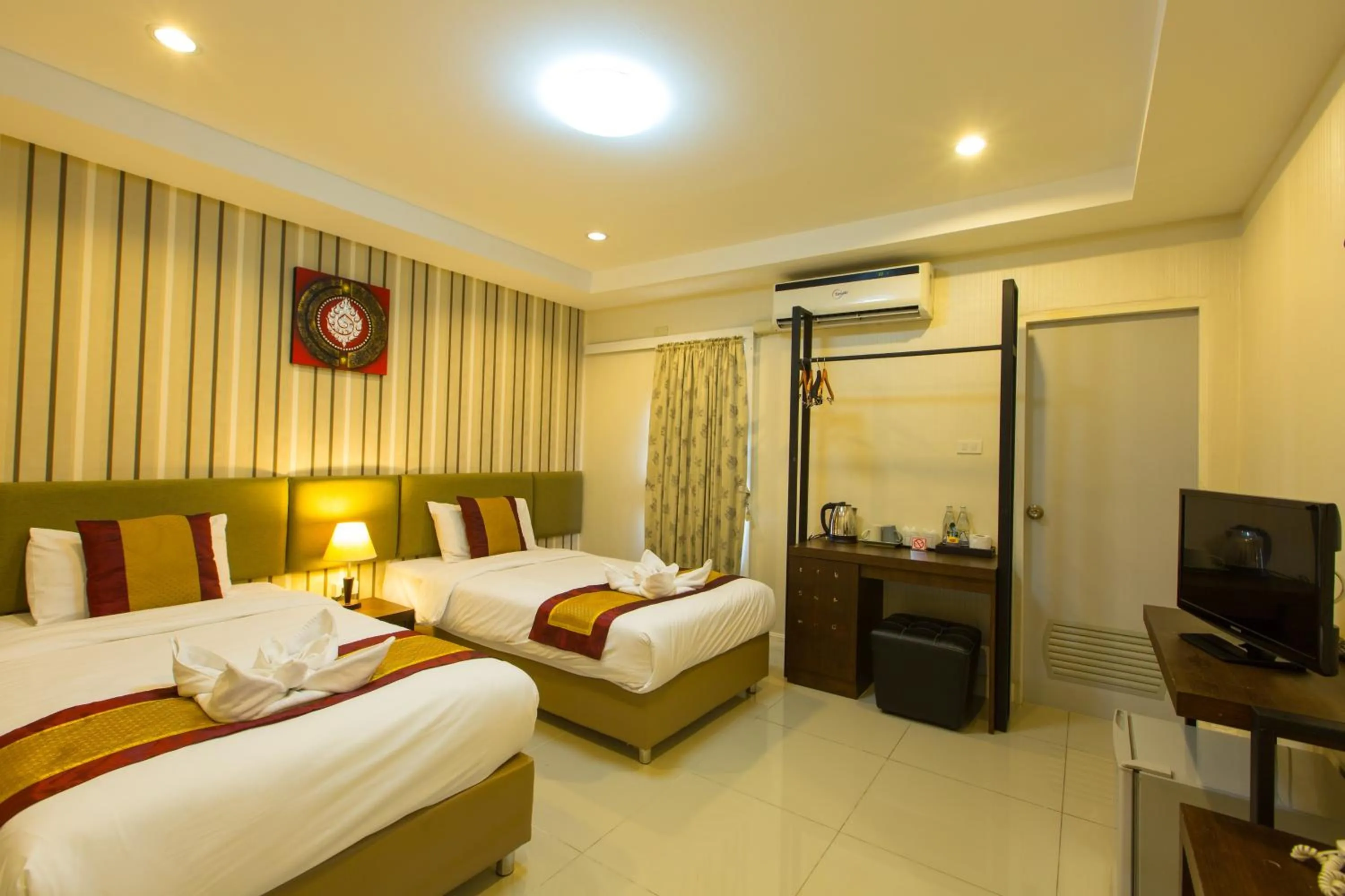 Photo of the whole room, Bed in Chiang Mai Waroros Boutique Hotel