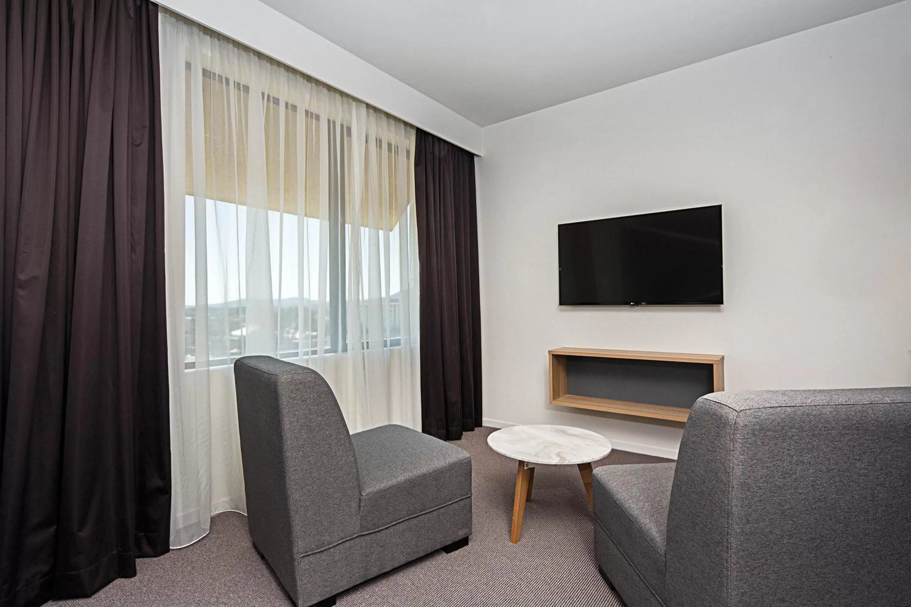 Living room in Mantra MacArthur Hotel