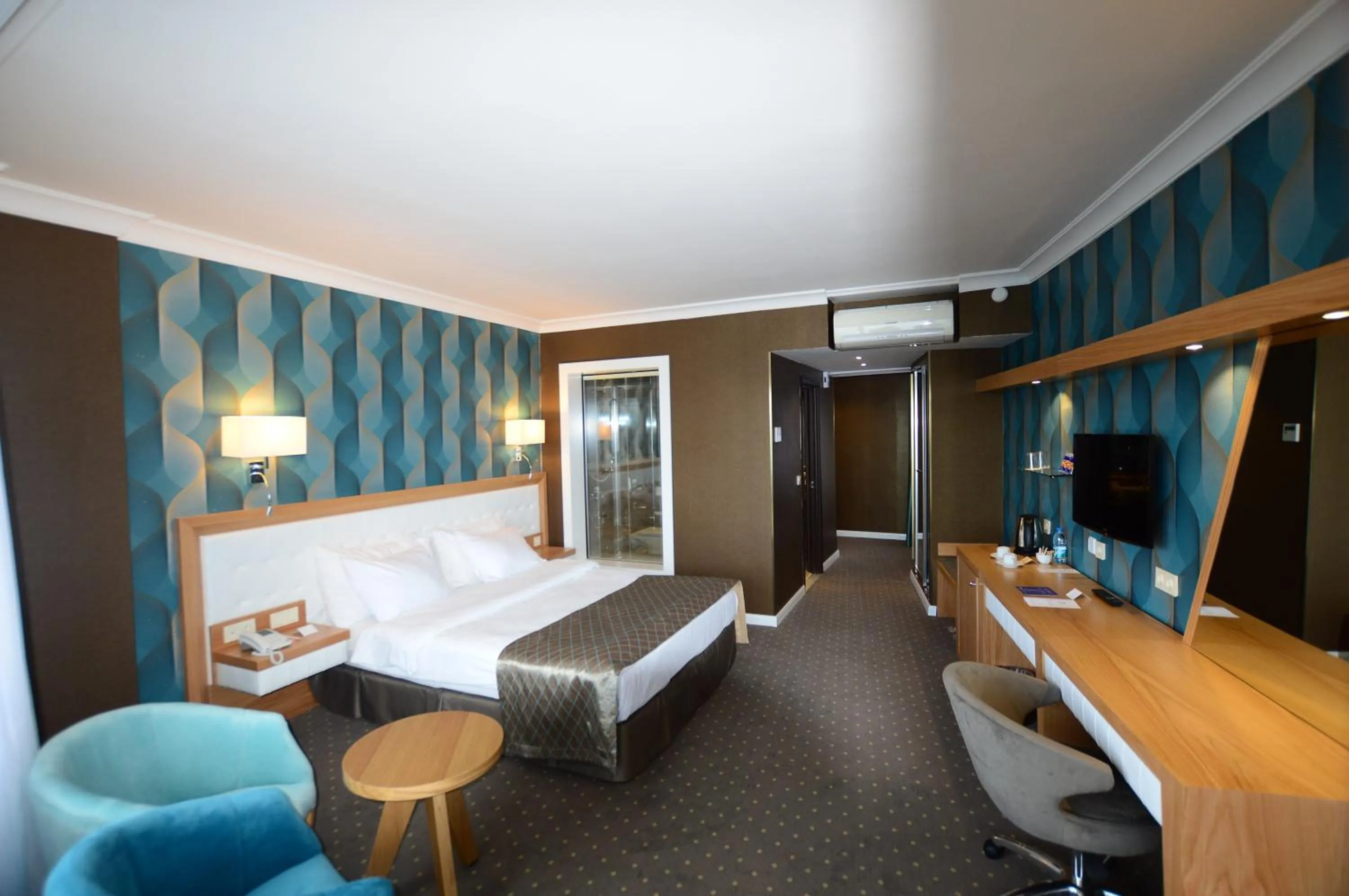 Photo of the whole room, Bed in Akol Hotel