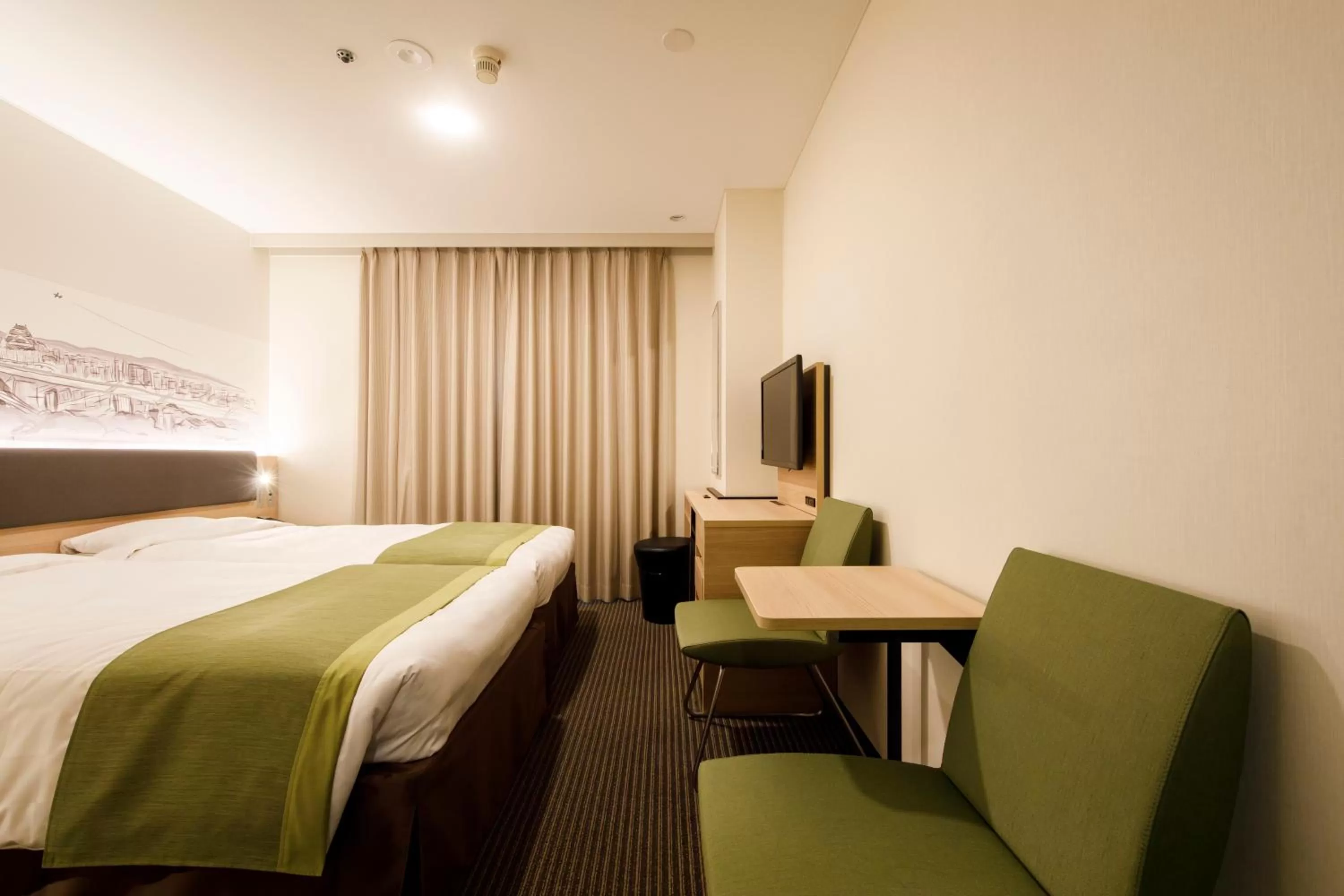 Photo of the whole room, Bed in Shin Osaka Esaka Tokyu REI Hotel