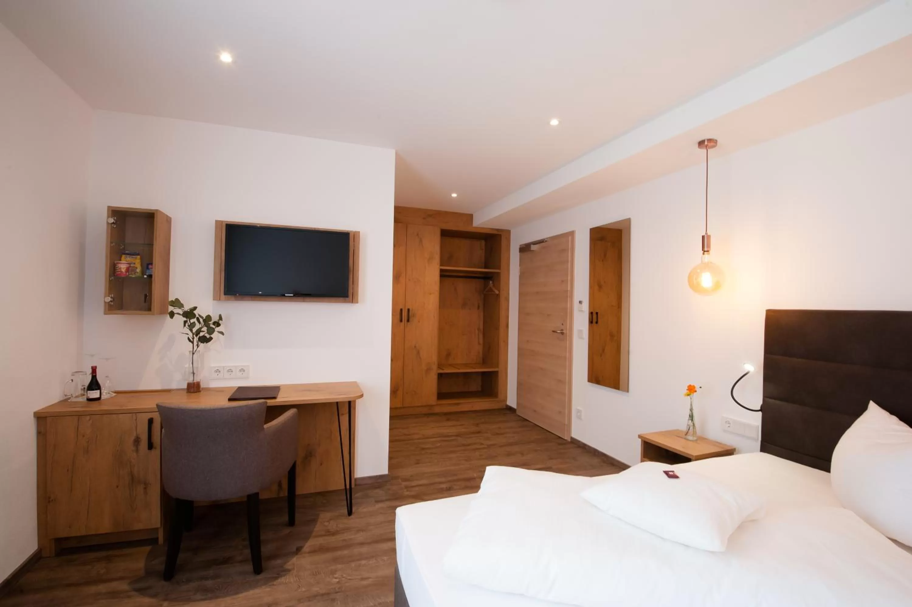 Shower, Bed in Hotel Schwaiger