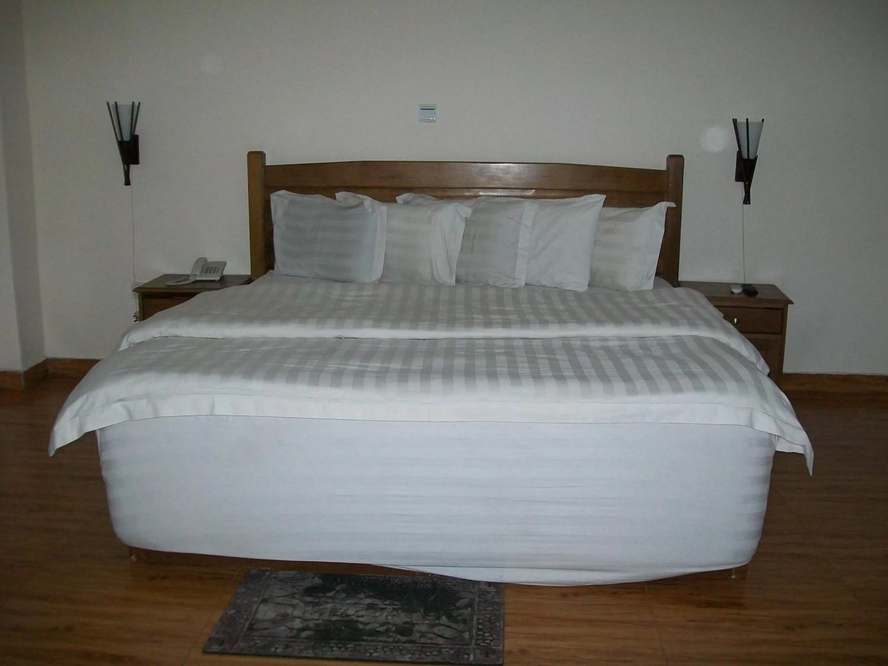 Bed in Ampomaah Hotel