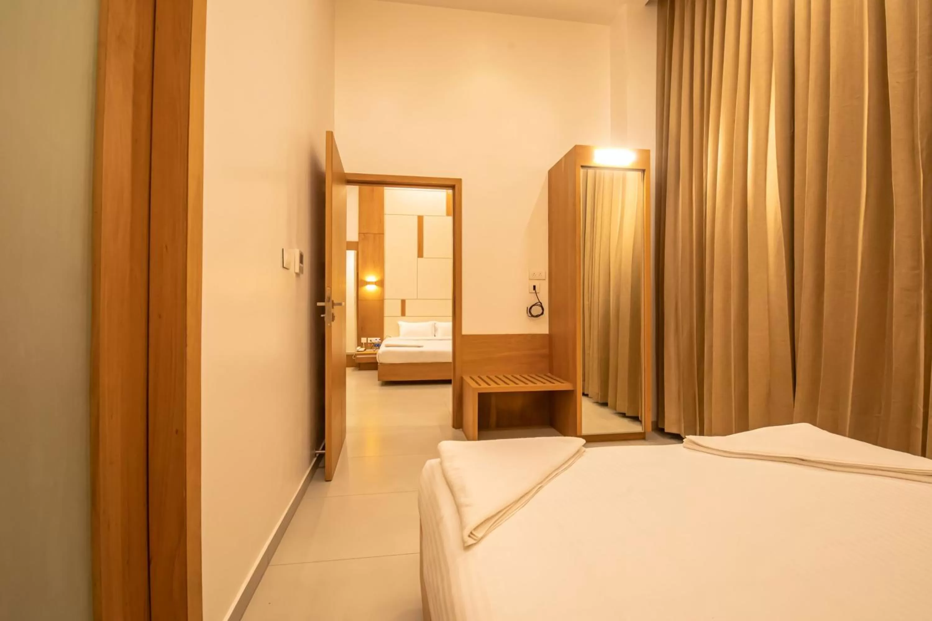 Photo of the whole room, Bed in RATHNA RESIDENCY - Near US CONSULATE