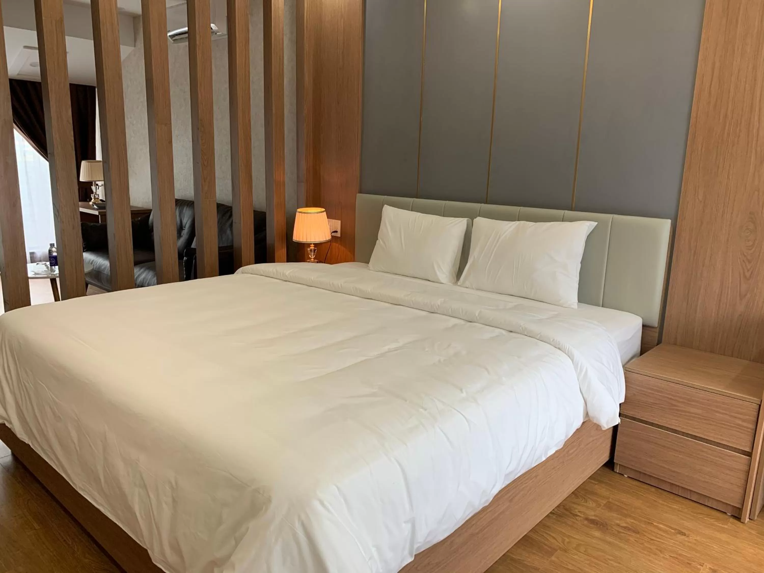 Bed in Galaxy Grand Hotel