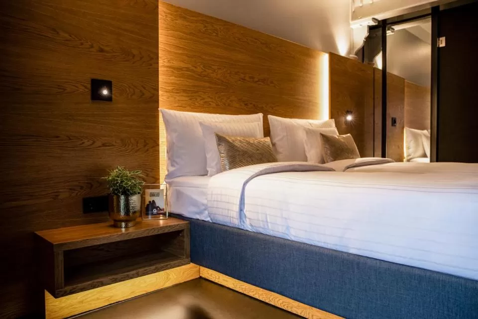 Photo of the whole room, Bed in GINN Hotel Hamburg Elbspeicher