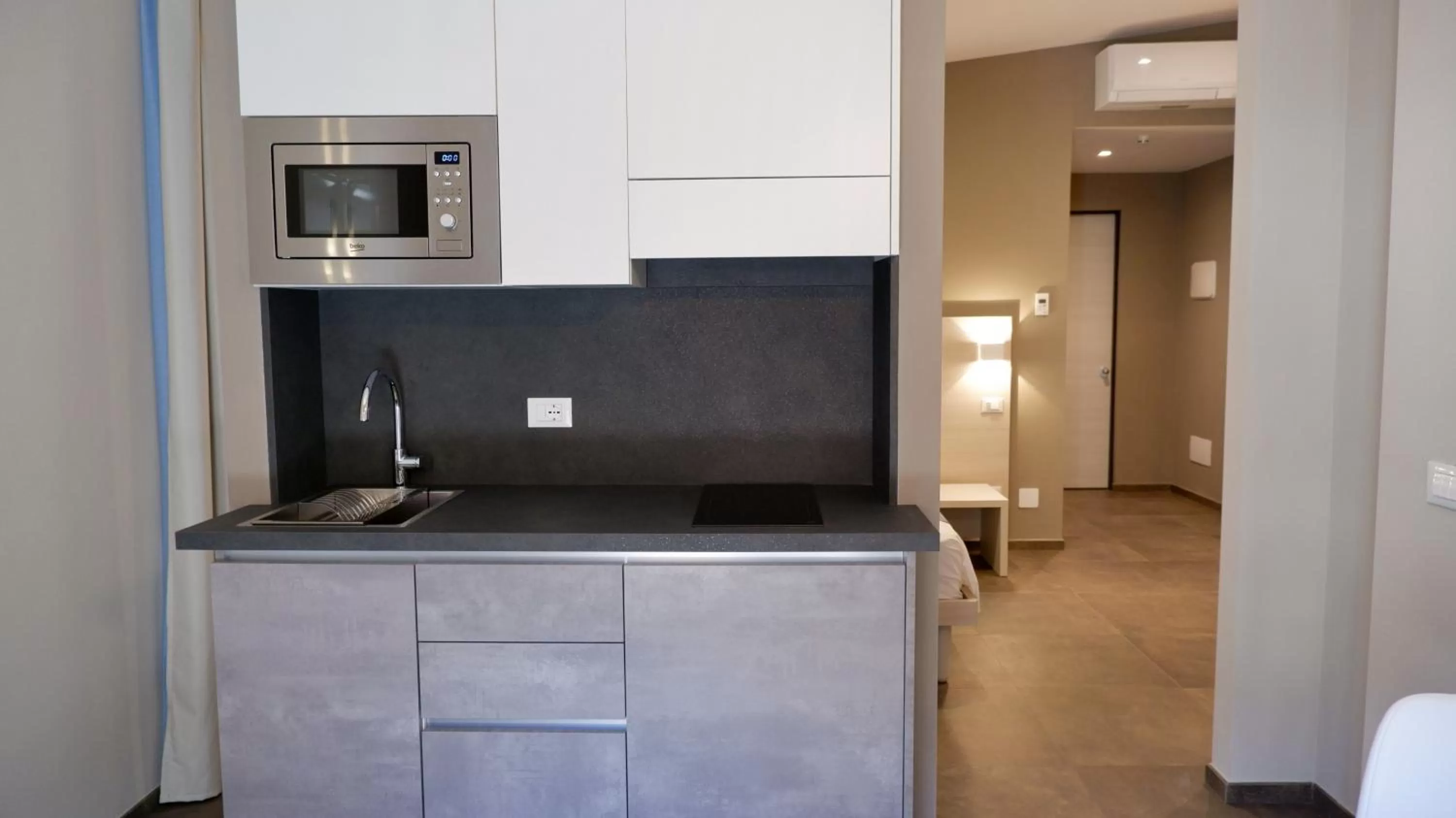 Kitchen/Kitchenette in Pianomare Riviera Apartments and Rooms