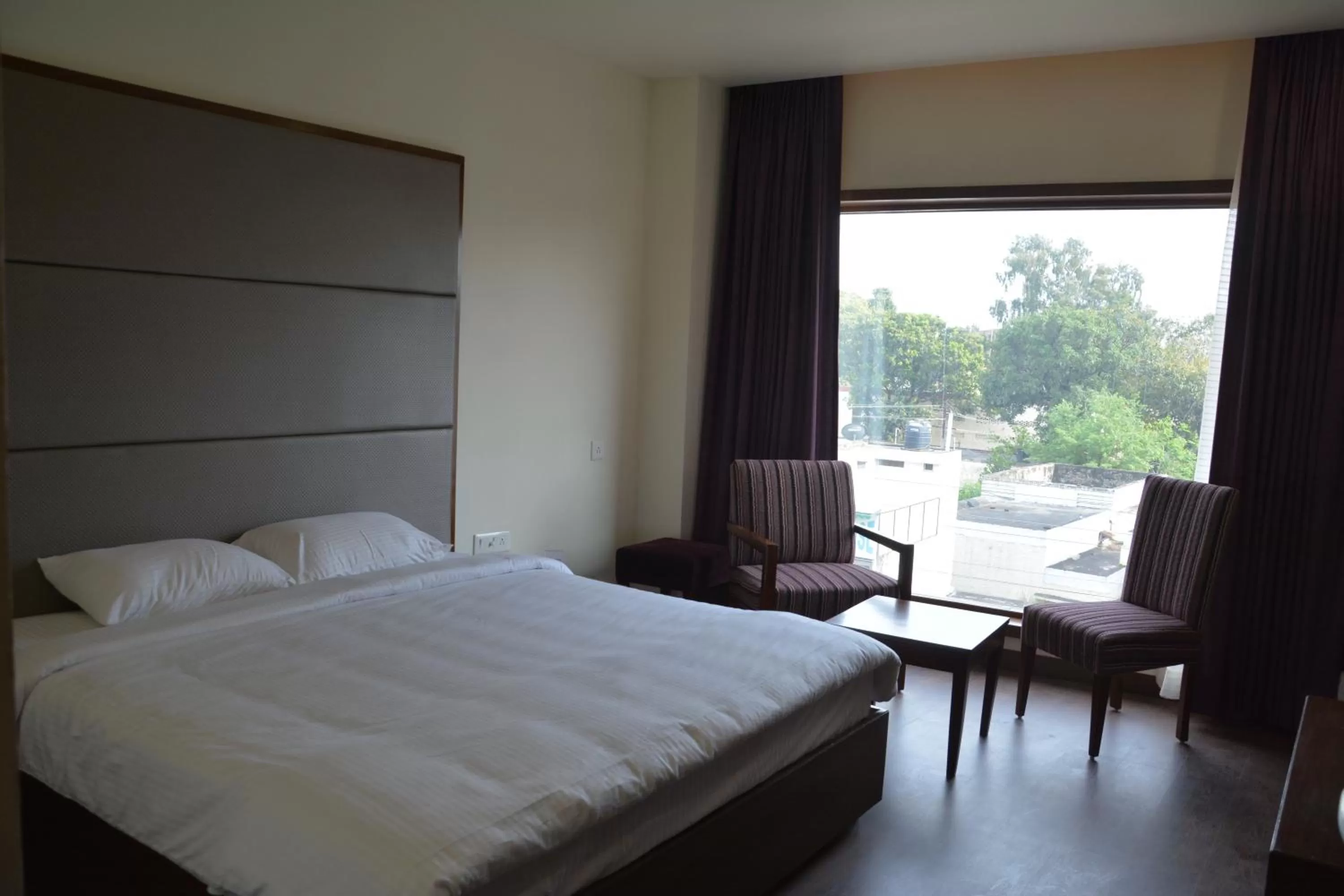 Bed in Green Hotel & Restaurant