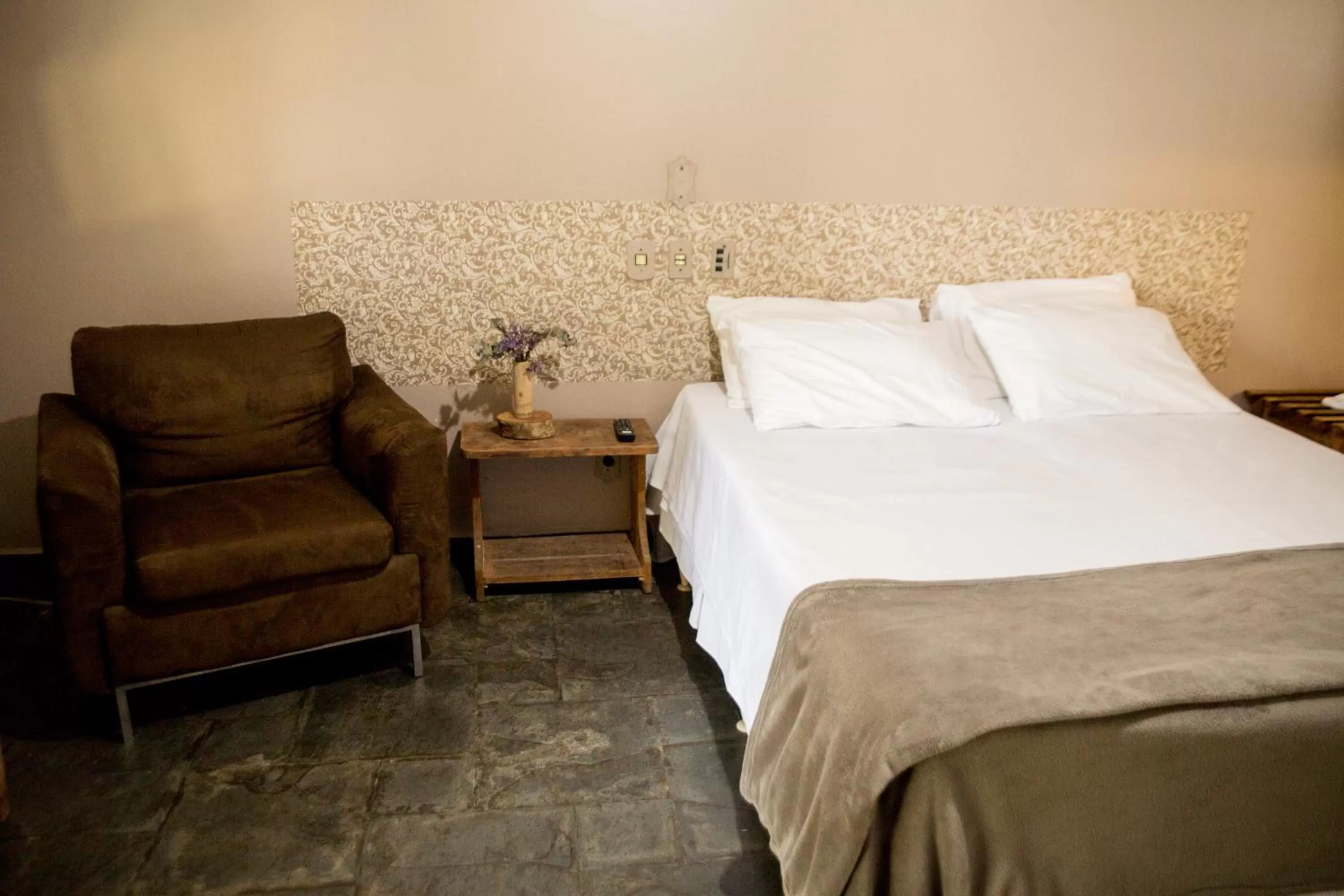 Bed in Pousada Flor da Serra