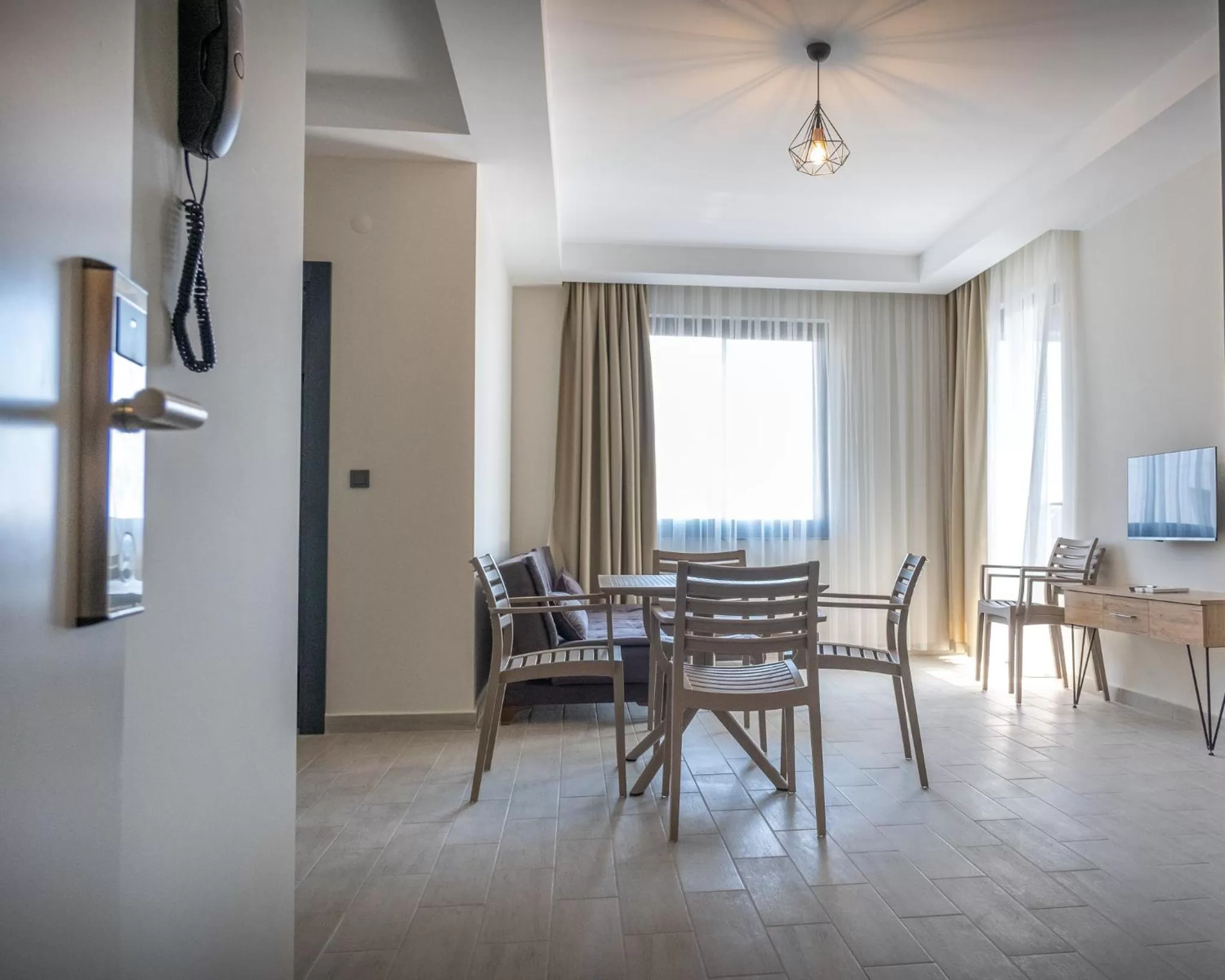 Living room, Dining Area in Nas Suite