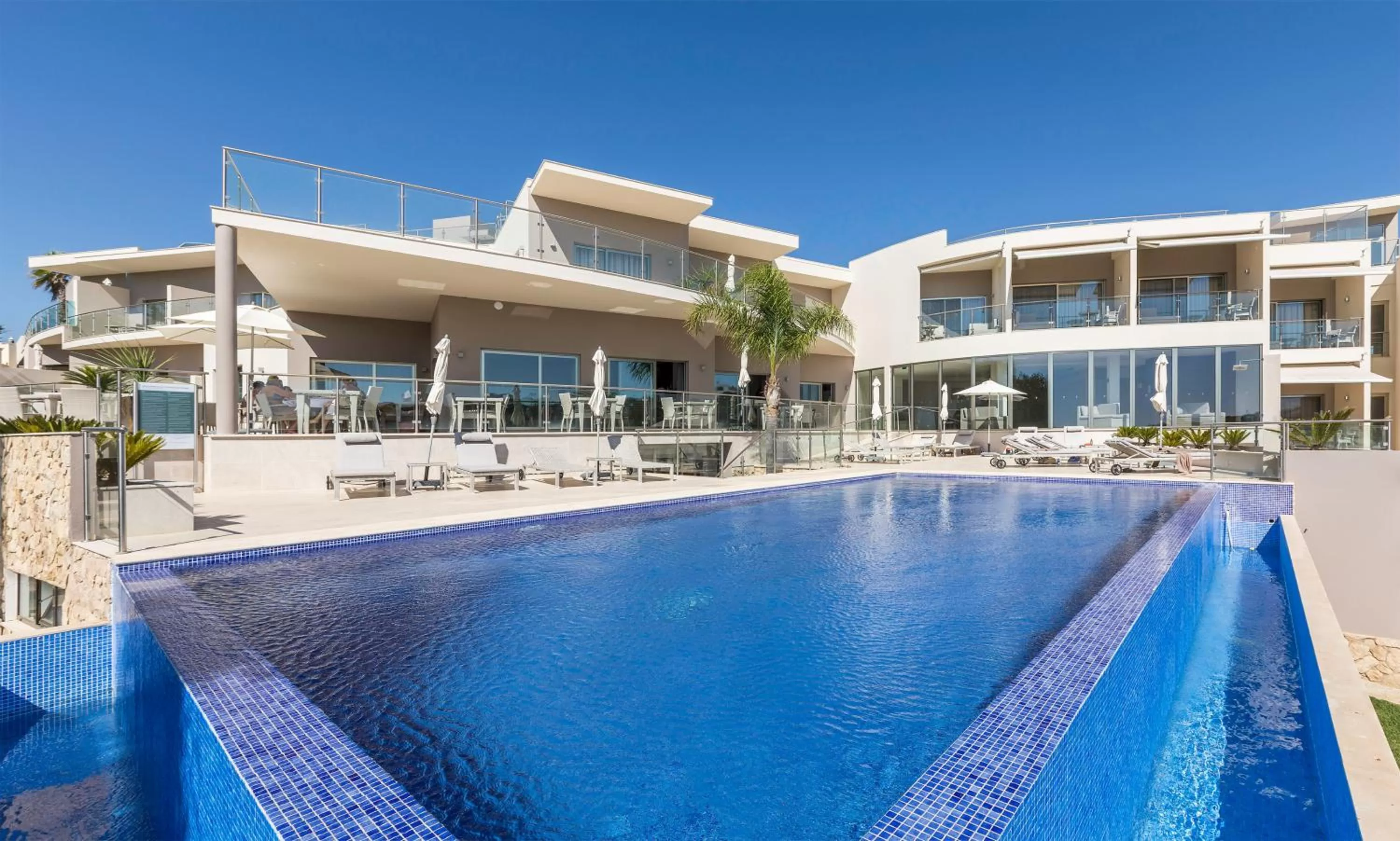Swimming pool in Caneiros Luxury House & Suites