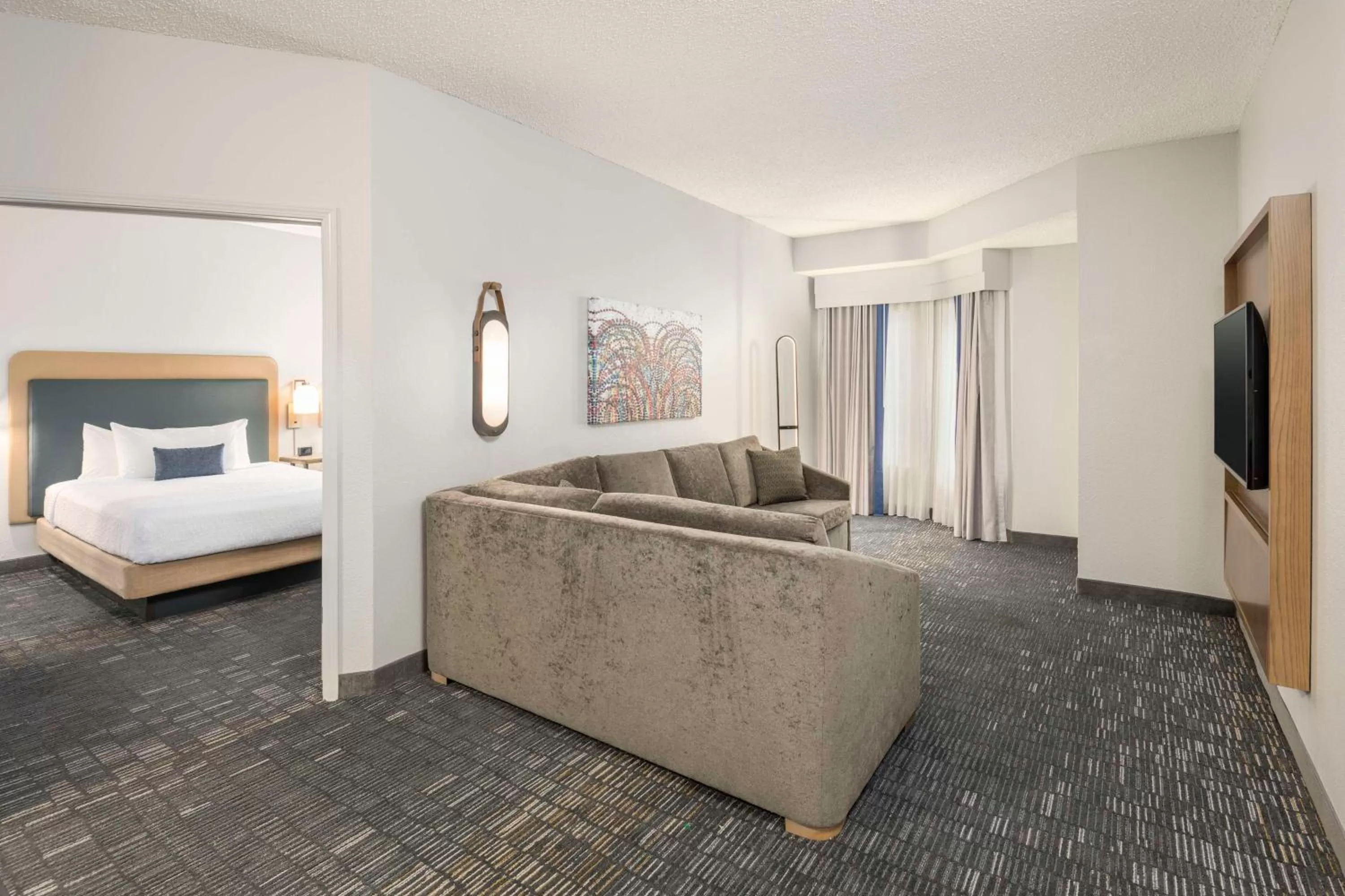 Living room, Bed in Homewood Suites by Hilton New Orleans