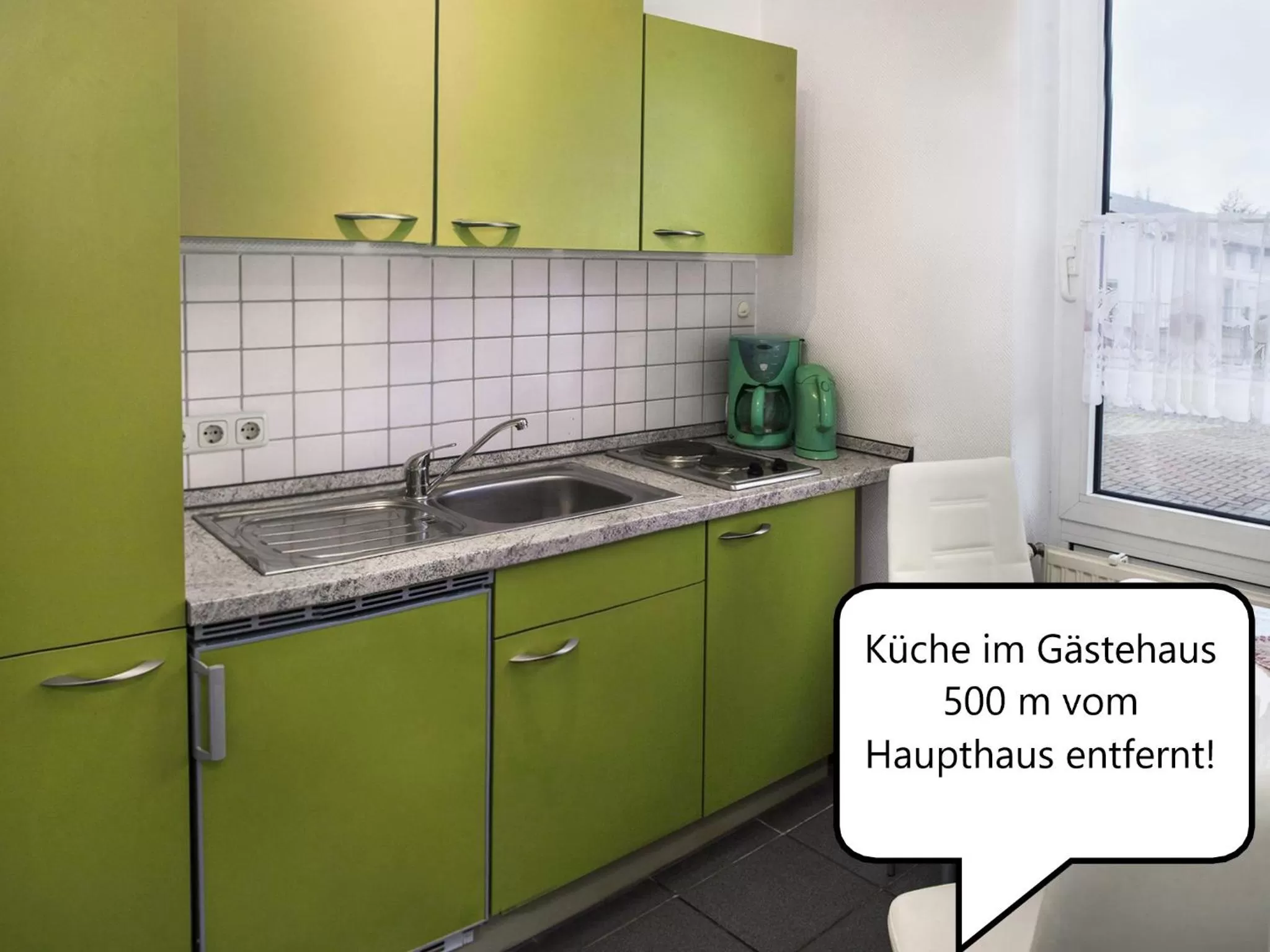 Communal kitchen in Gasthof Scharfe Kurve