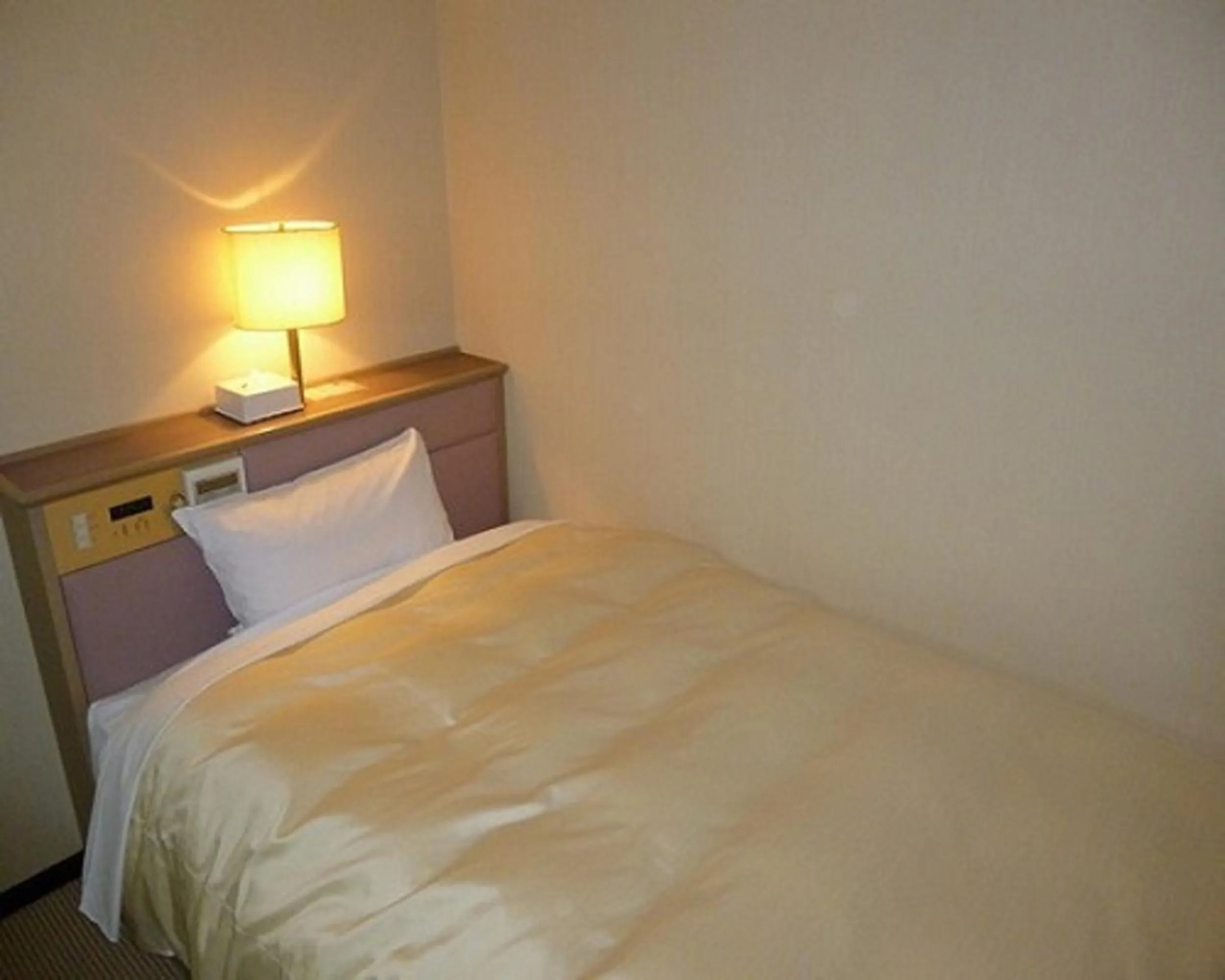 Bed in Hotel Fukushima Hills