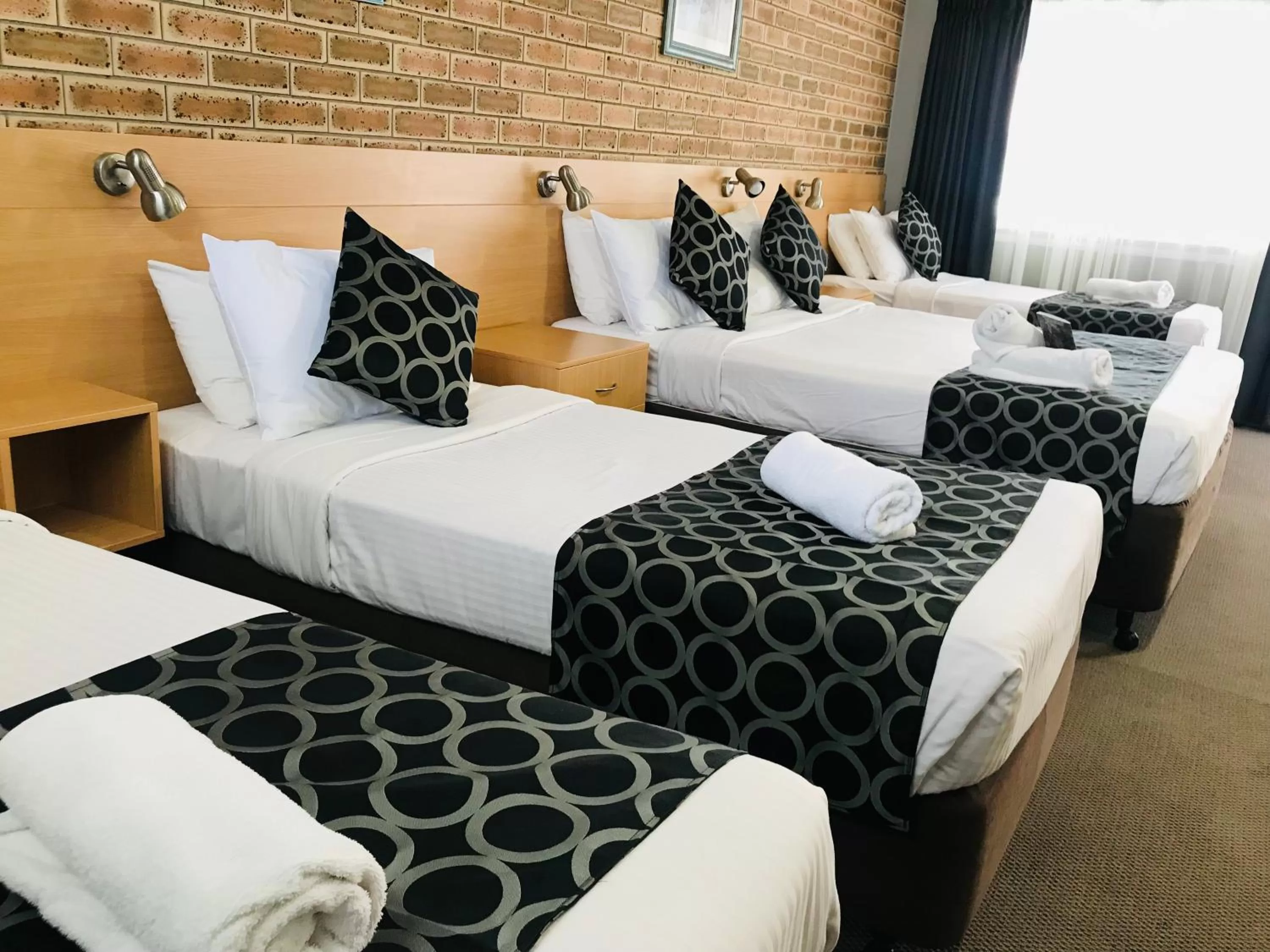 Bed in Jumbuck Motor Inn