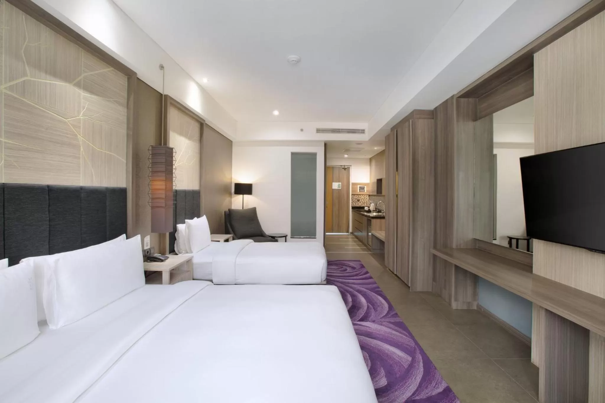 Photo of the whole room, Bed in Holiday Inn Bandung Pasteur by IHG