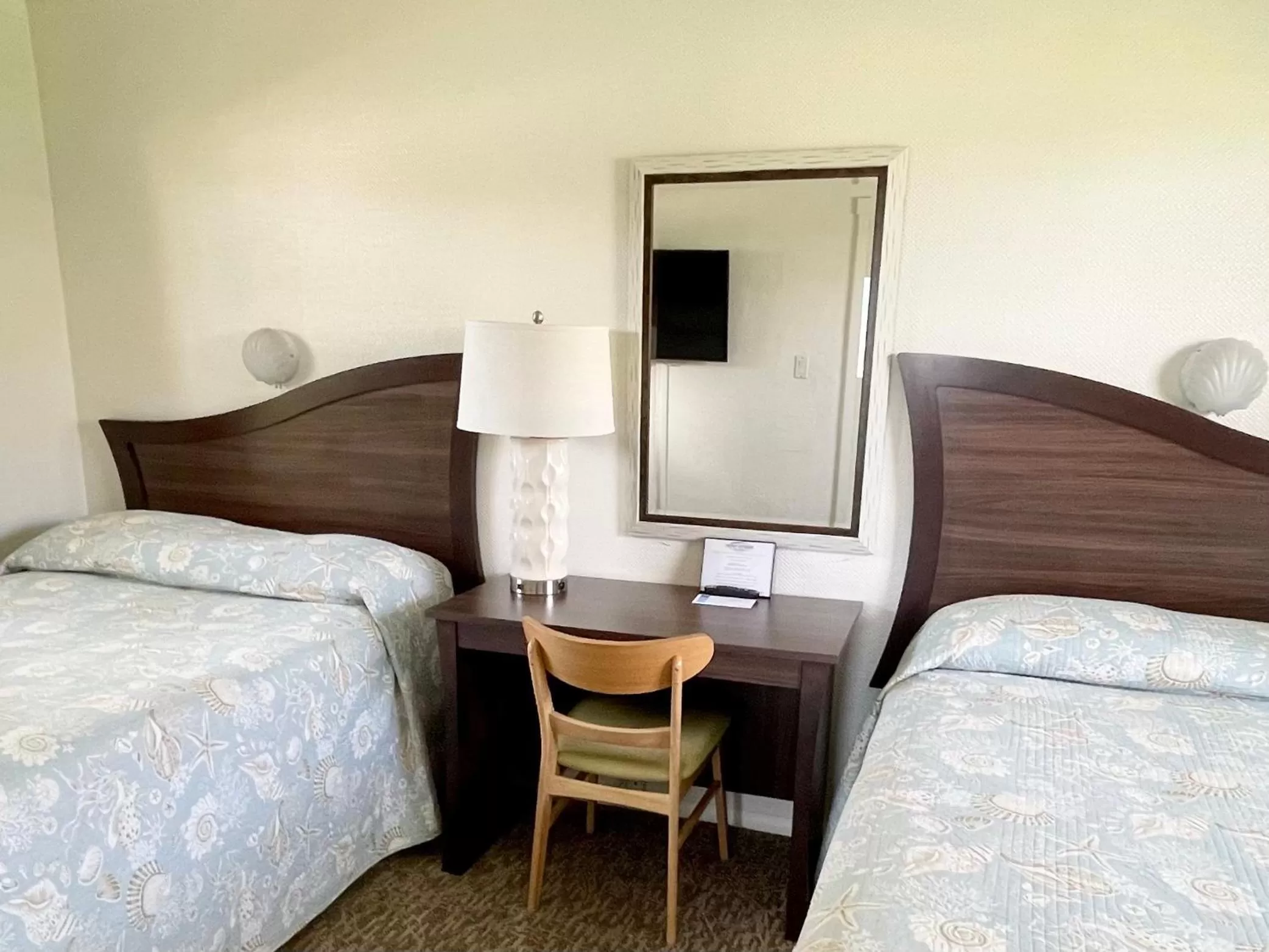 Bed in Surf Studio Beach Resort