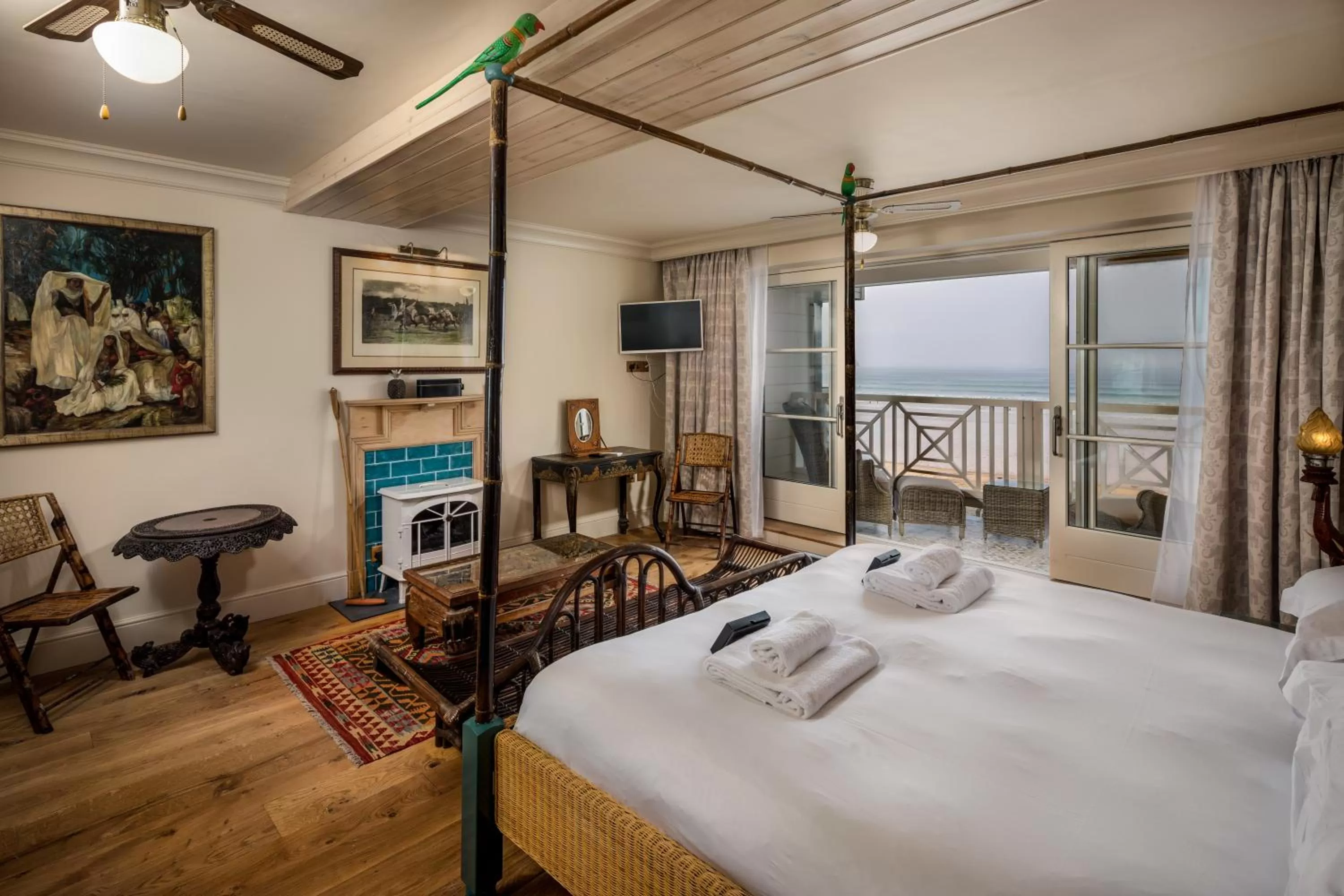 Balcony/Terrace, Bed in Tolcarne Beach Colonial Restaurant and Rooms