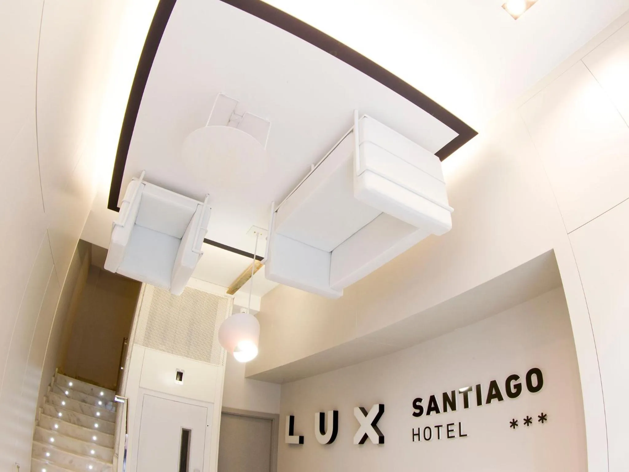 Lobby or reception in Hotel Lux Santiago
