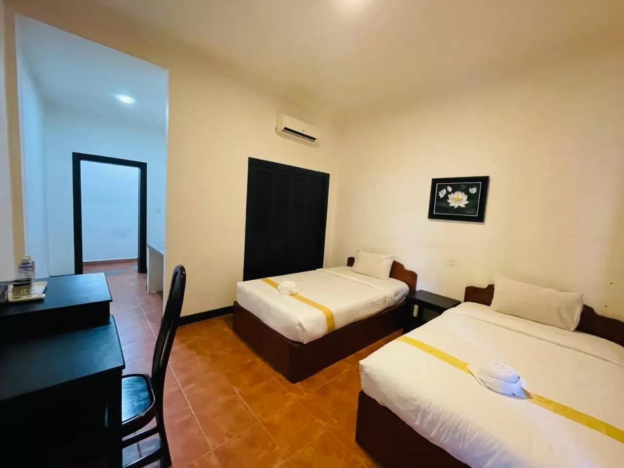 Bed in Angkor Tiger Resort