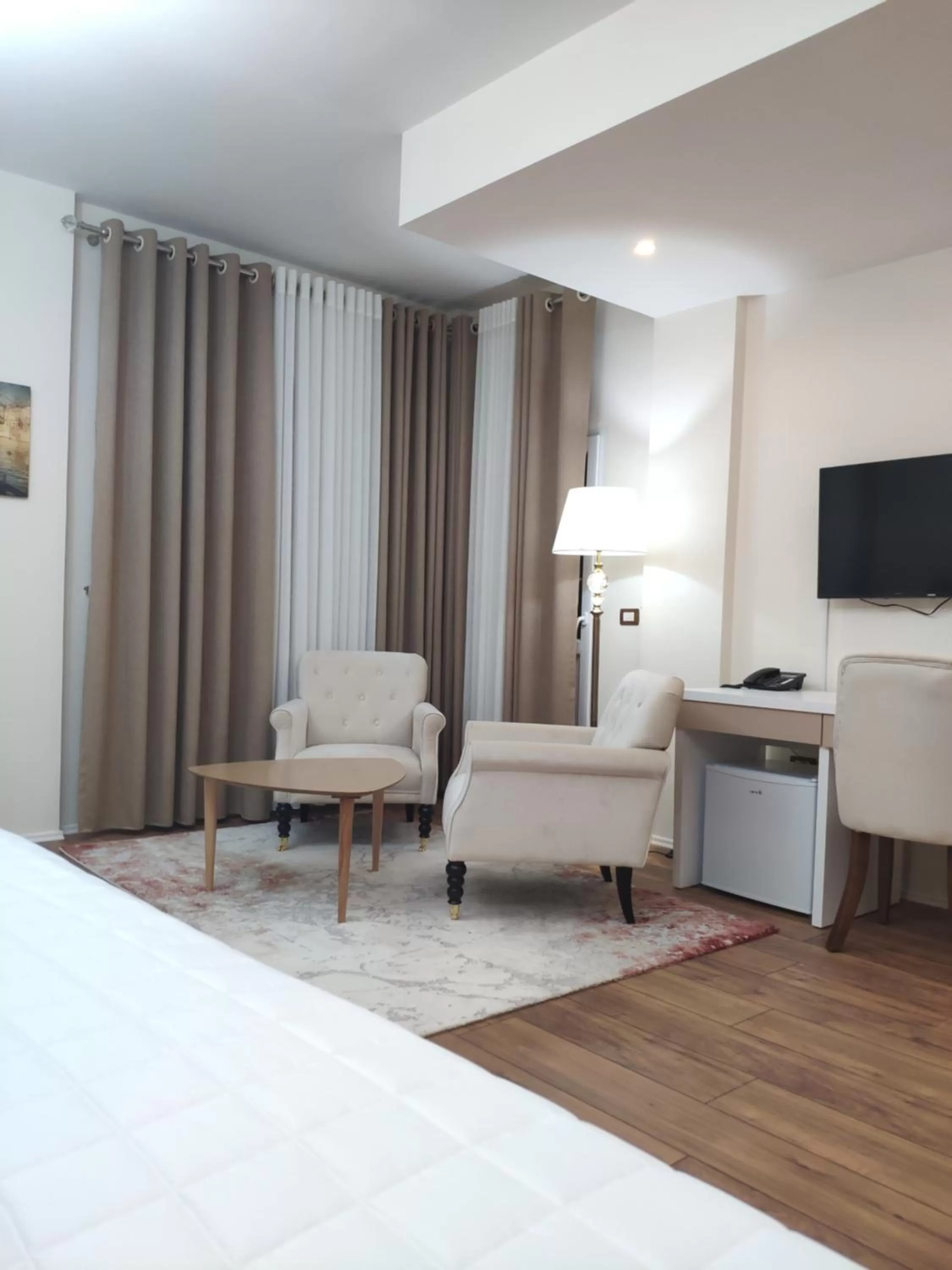 Seating area, Bed in Hotel TREVA