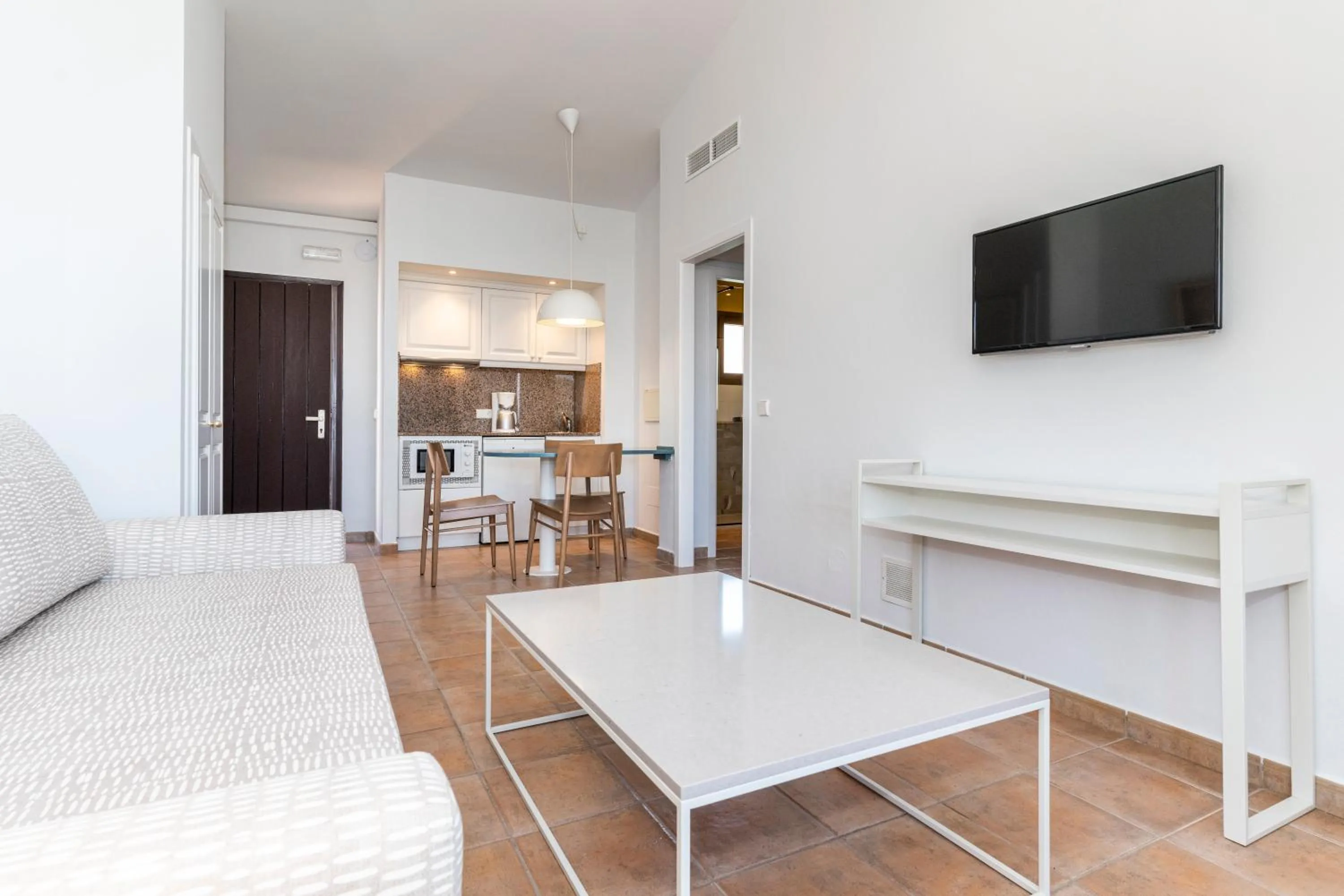 Living room in Aparthotel HG Cala Llonga