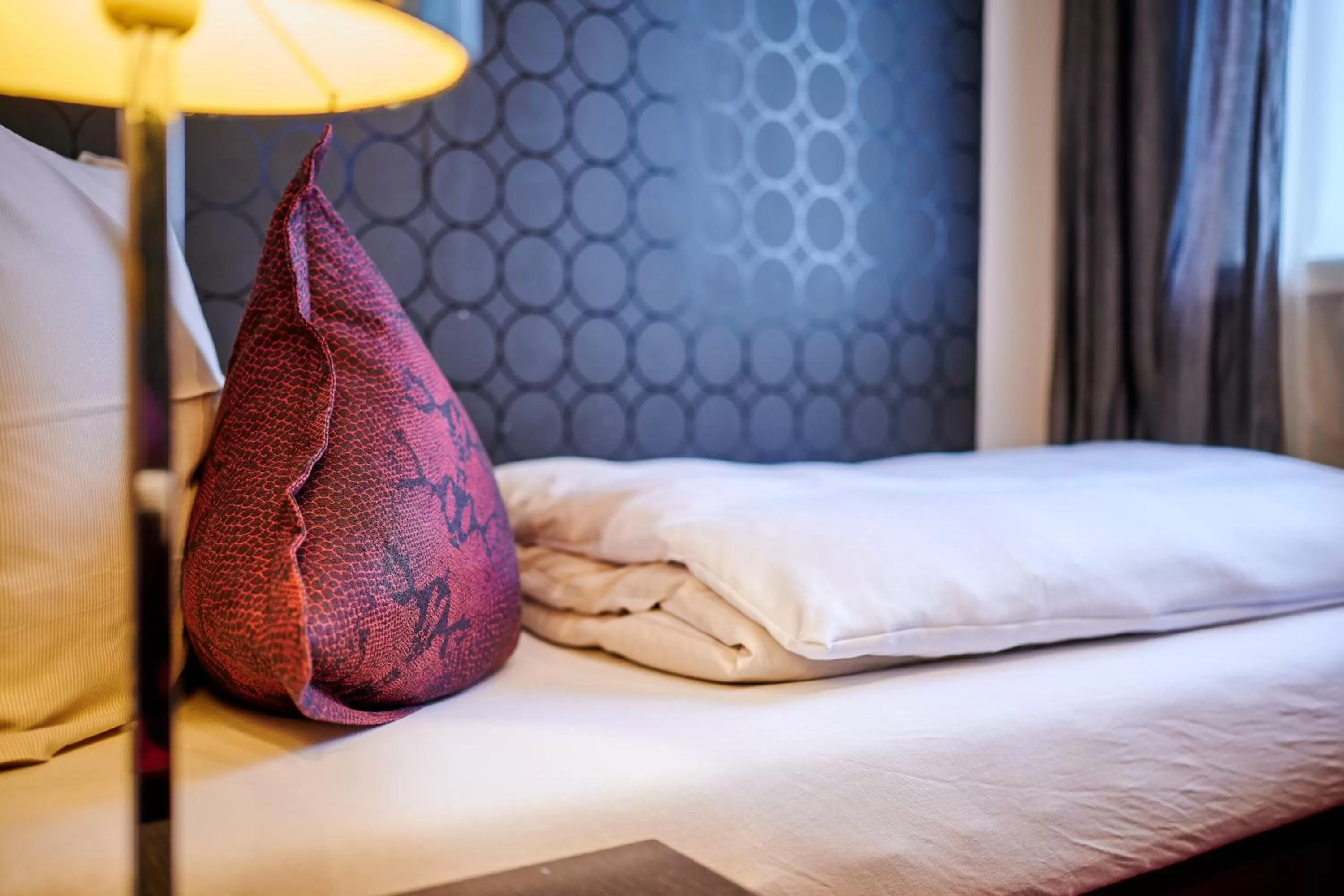 Bed in Genusshotel Wenisch