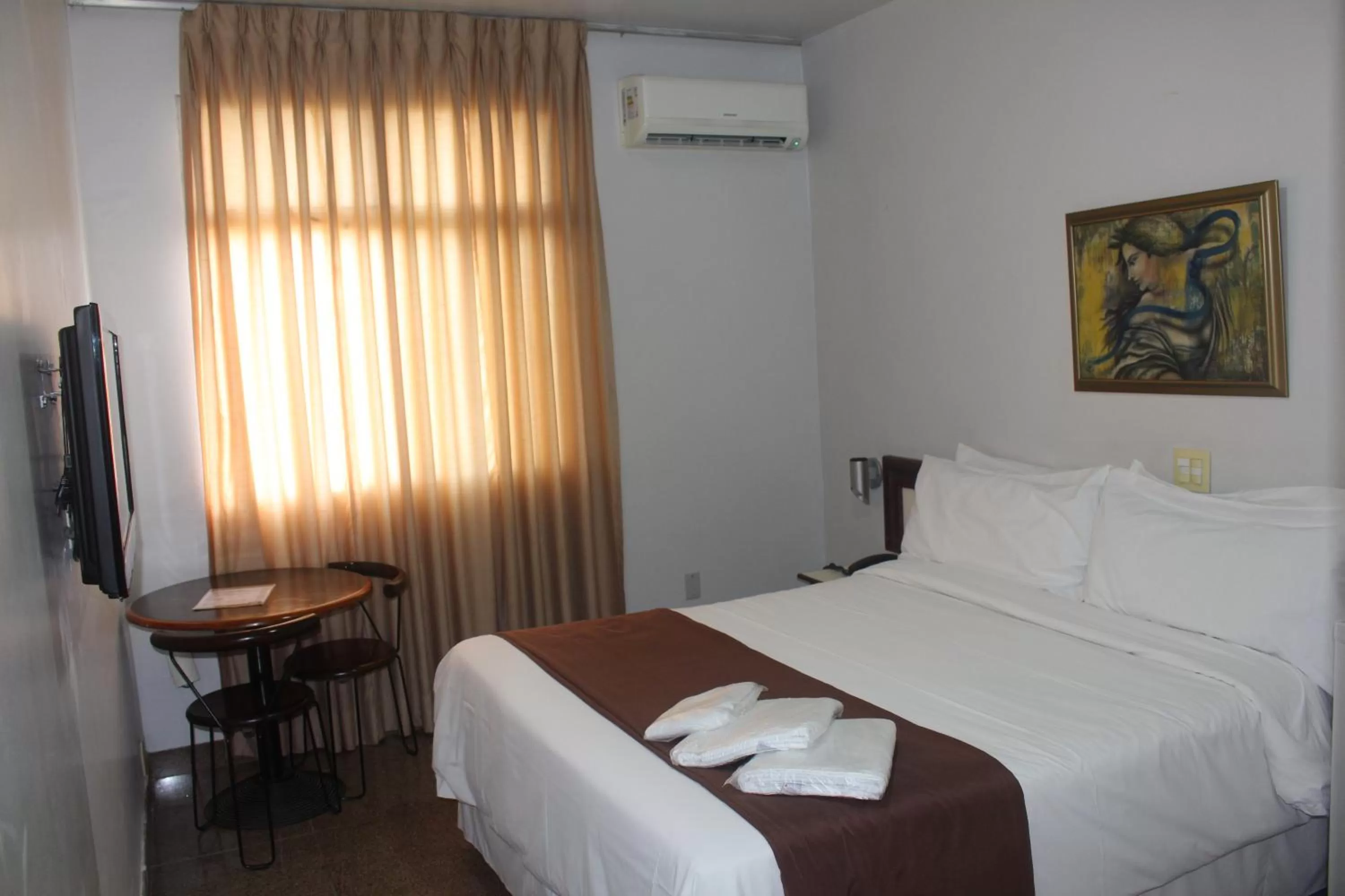 Bed in Hotel Oscar Econômico