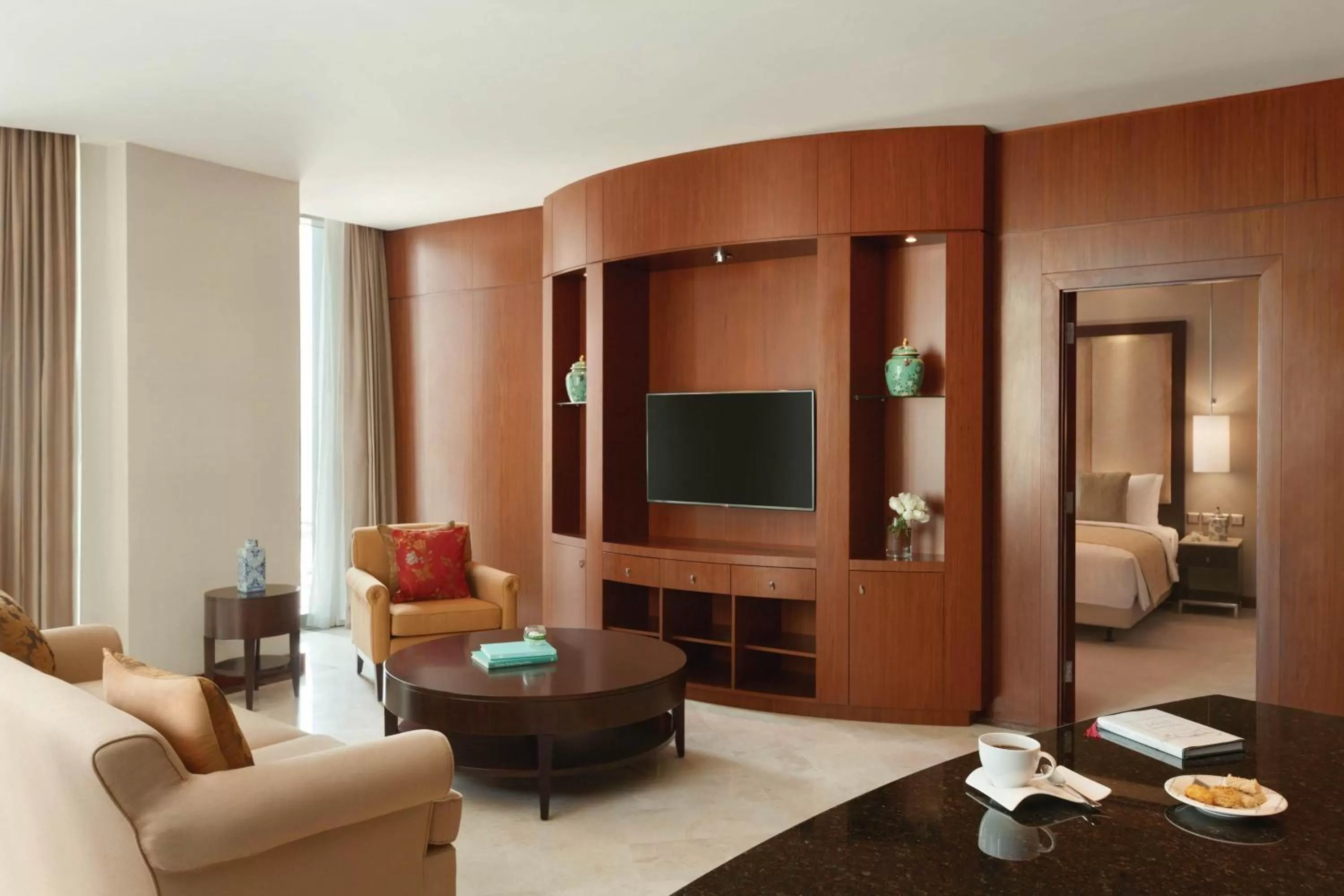 Living room, Bed in JW Marriott Marquis City Center Doha