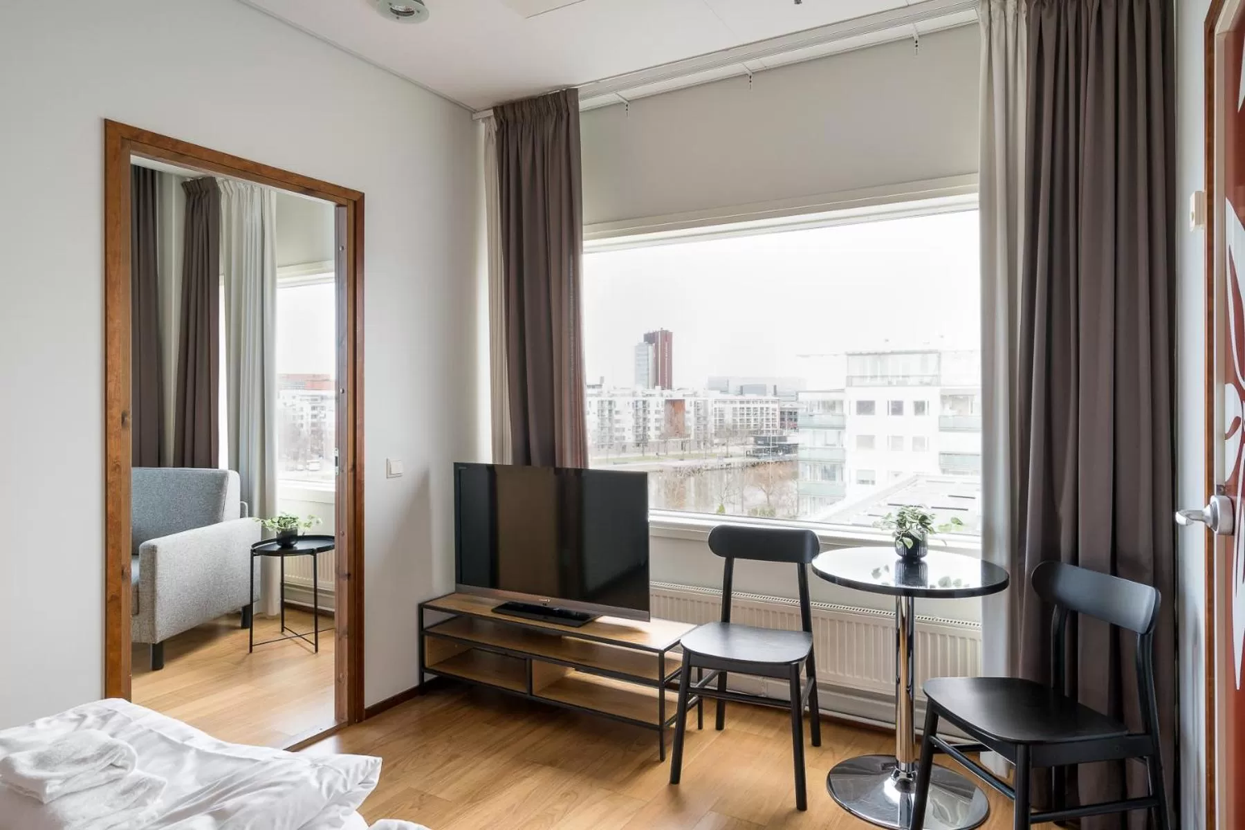 Seating area in Hiisi Hotel Helsinki Jätkäsaari