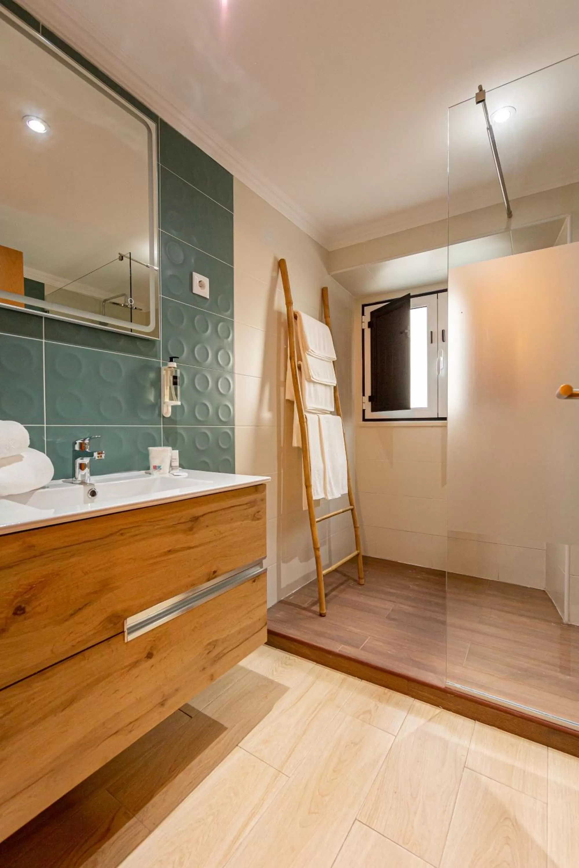 Shower, Bathroom in Luxury Palm Suites