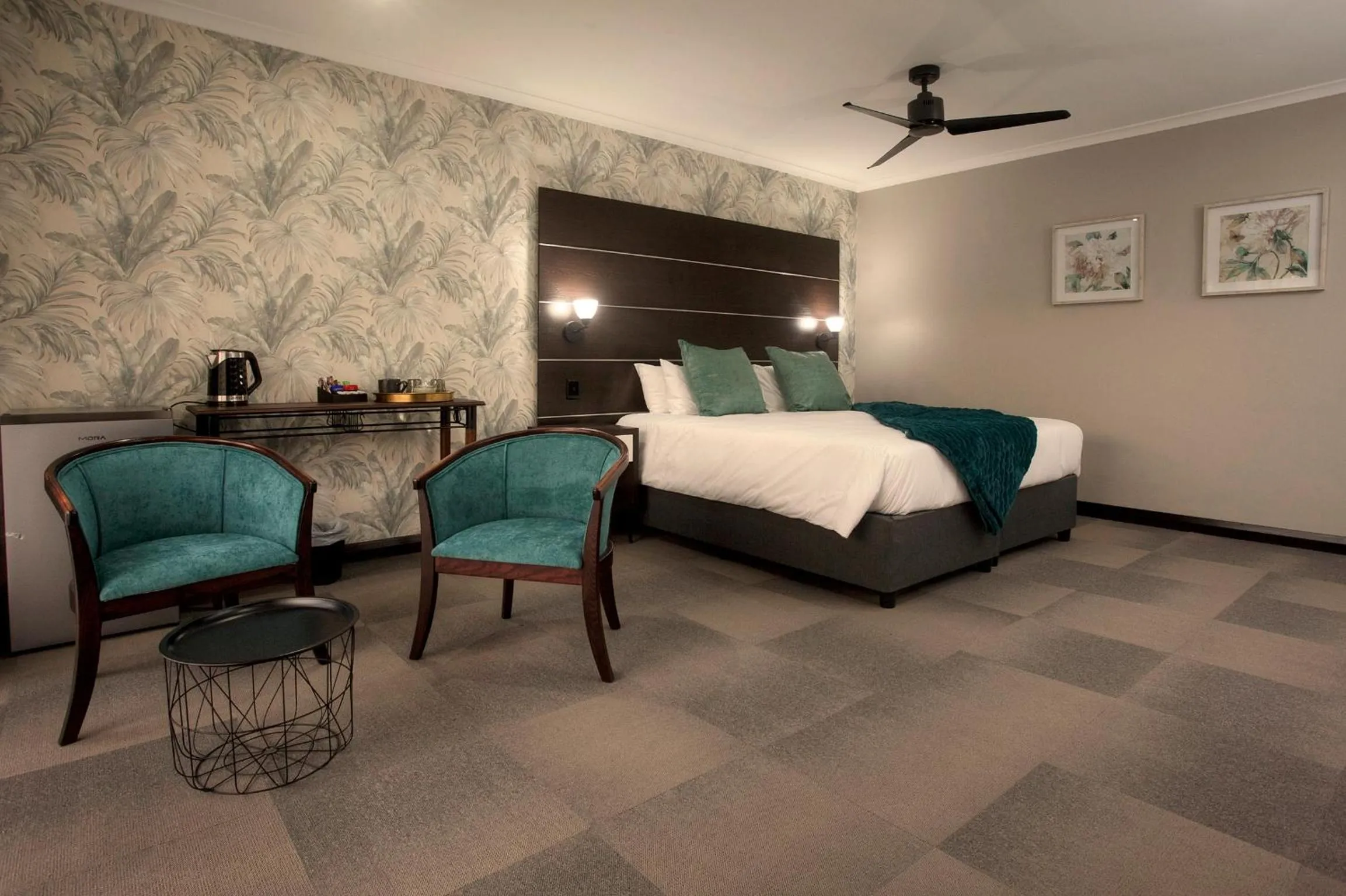 Seating area, Bed in The Hub Urban Hotel